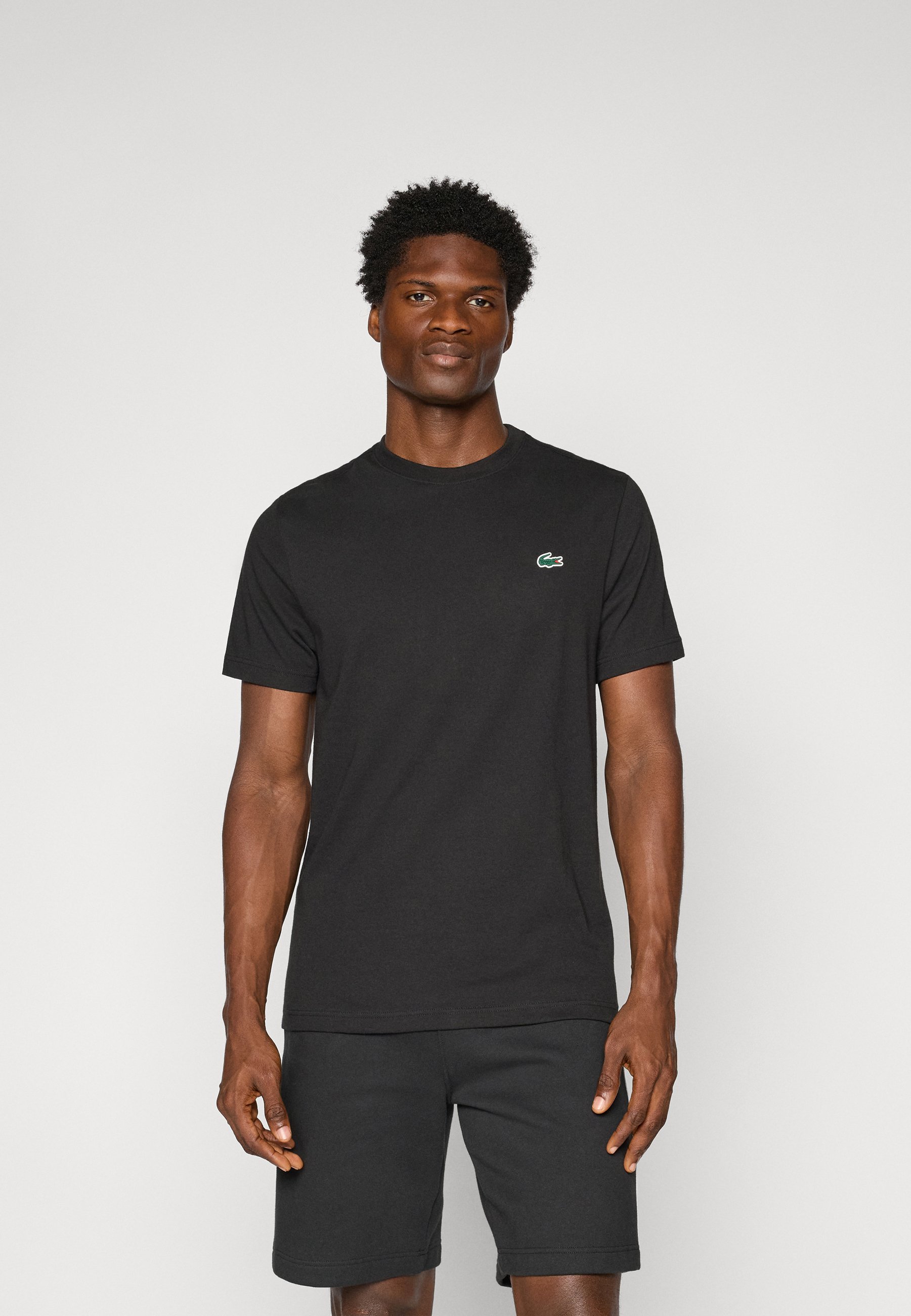 Lacoste Sport FADING - Koszulka sportowa - czarna