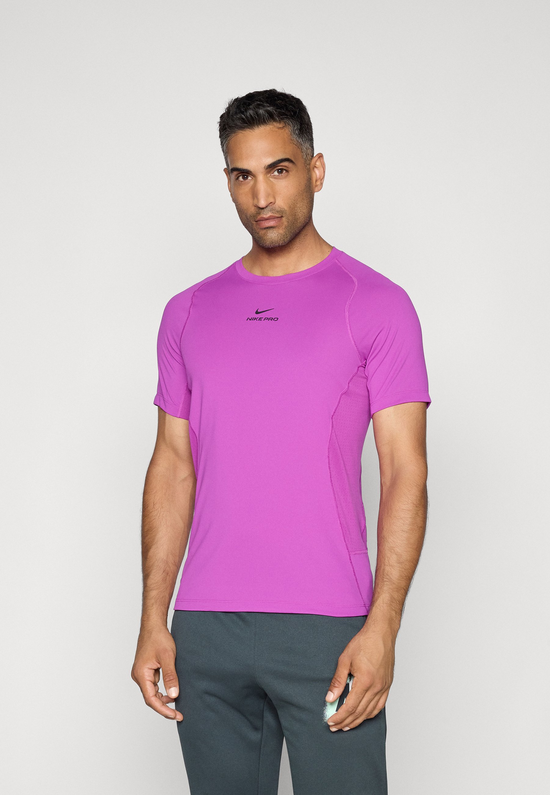 T-shirt de sport Nike Performance TOP - violet vif/noir