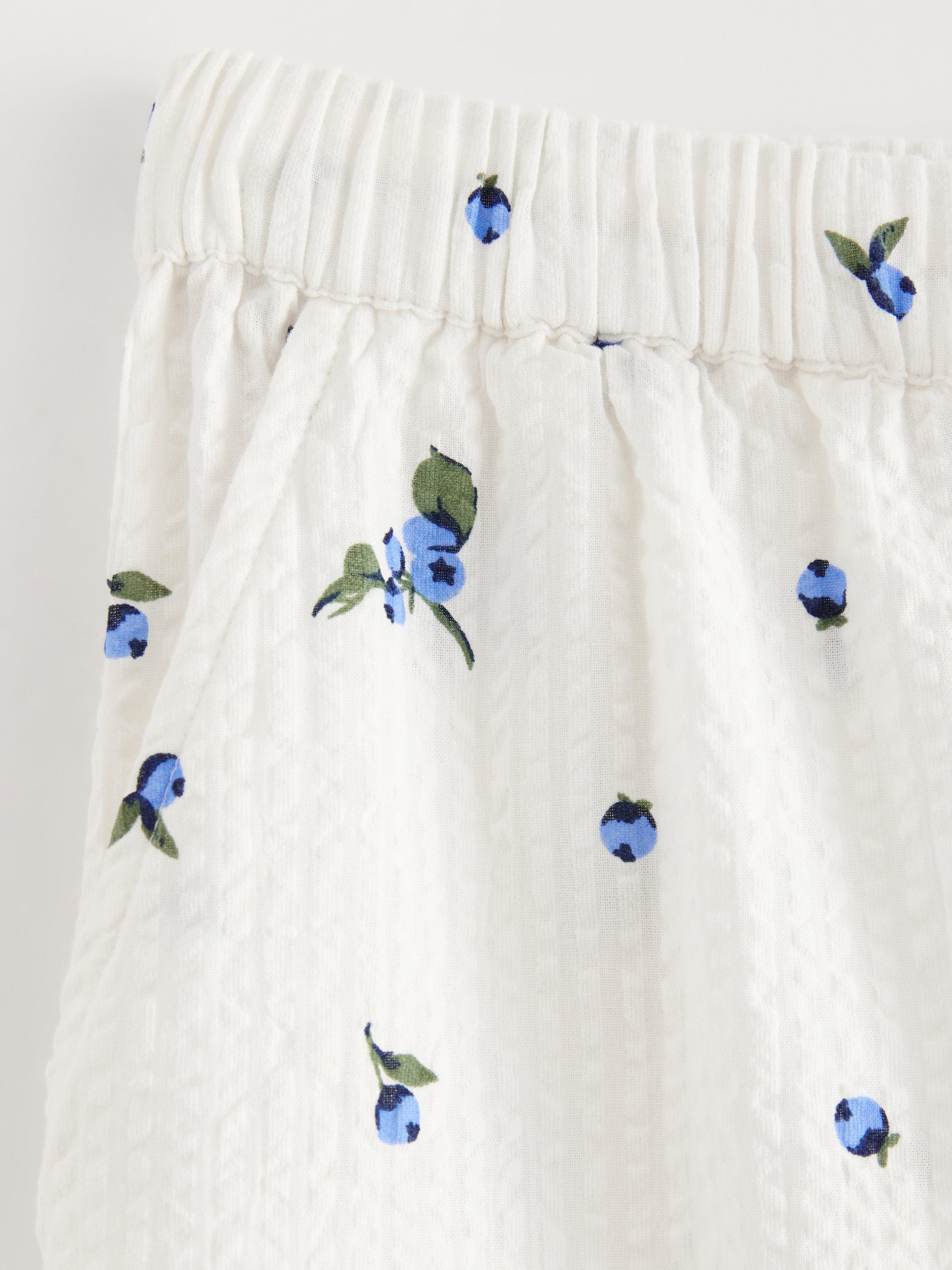 Pantalones de pijama con estampado de olas de arroyo