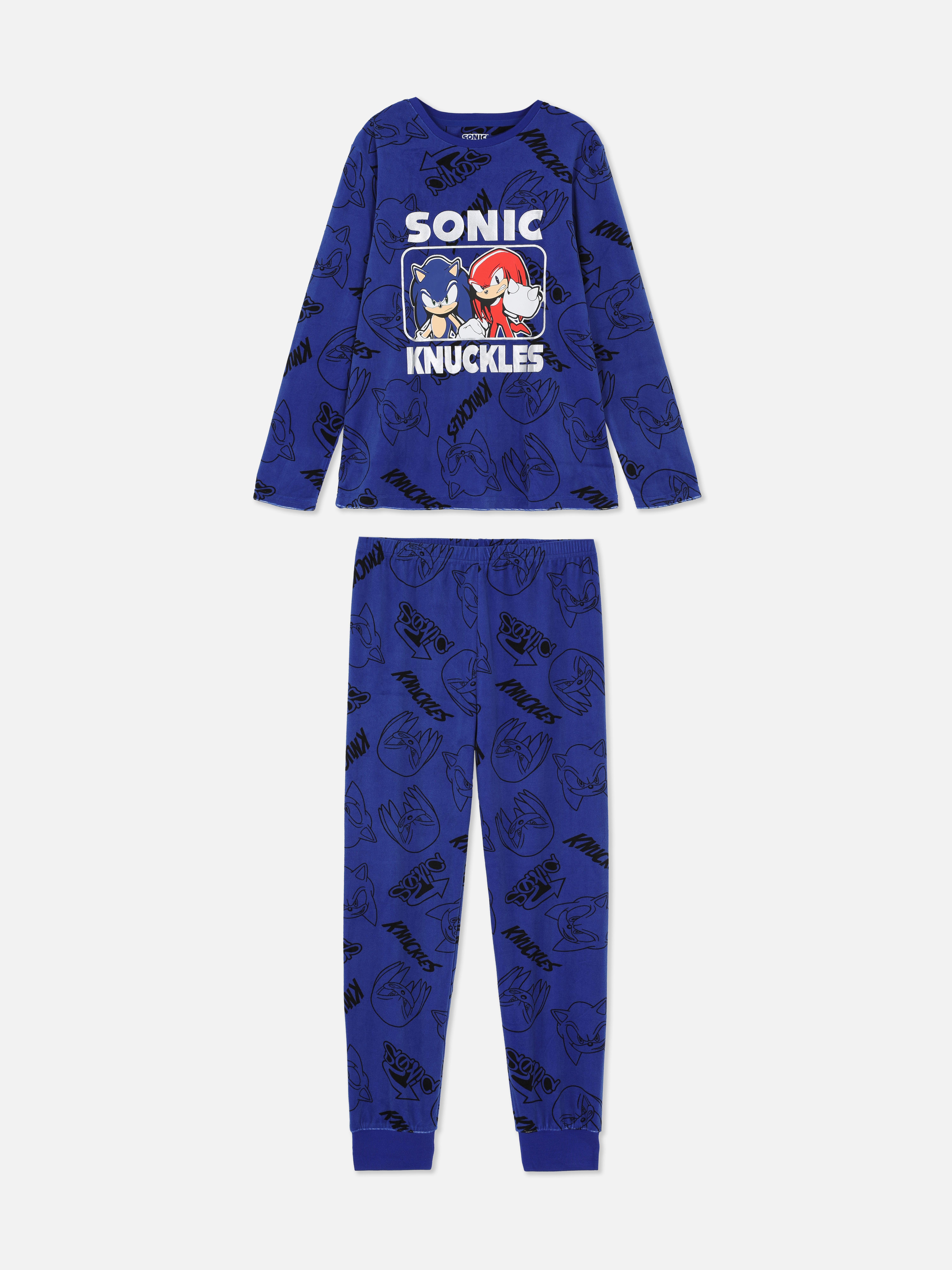 Tricou și pantaloni de pijama cu Sonic Ariciul. Micul tău jucător se grăbește spre confortul de seară în aceste pijamale cu Sonic.