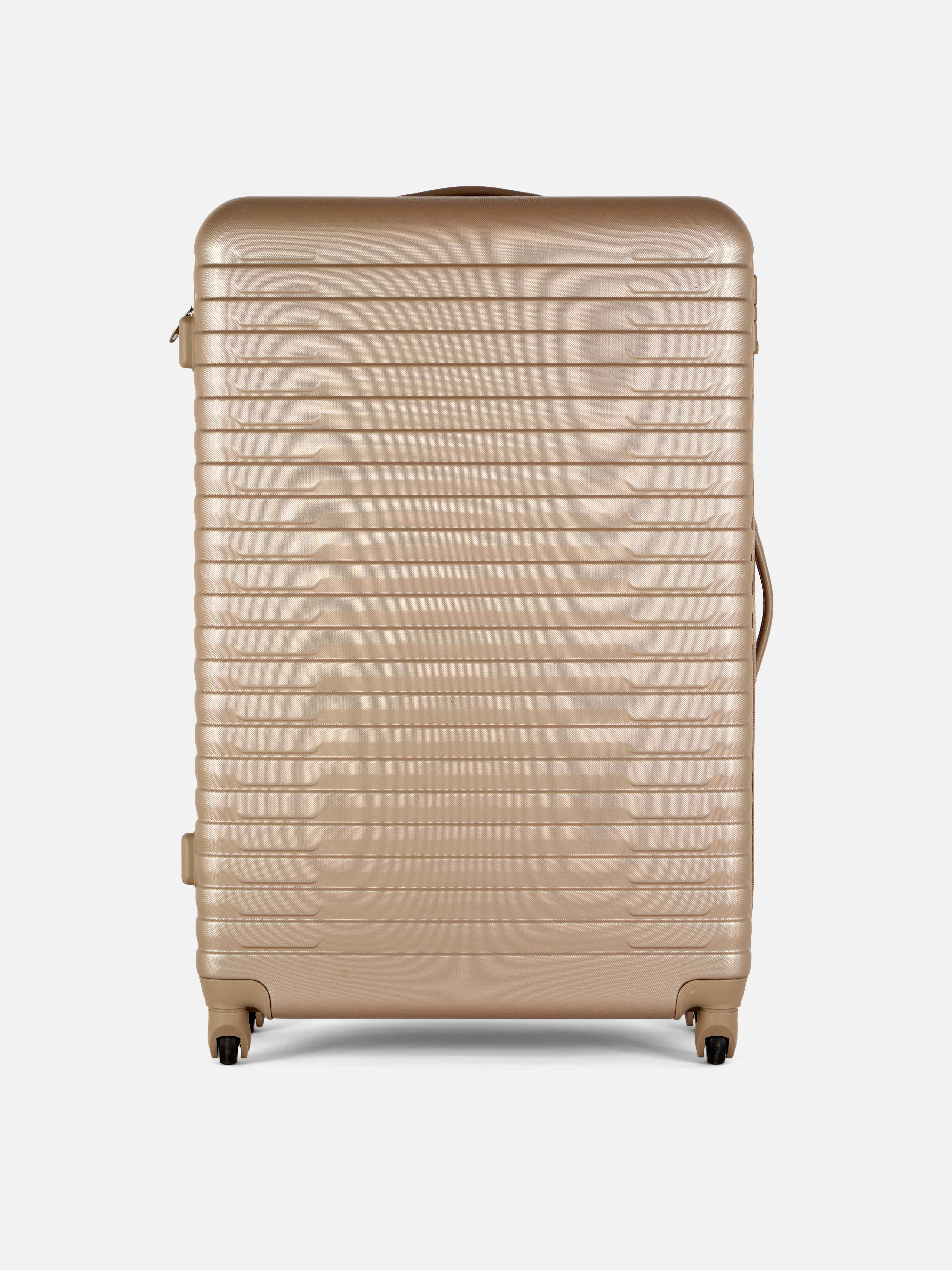 Valiză rigidă cu design striat și patru roți. Valiza noastră rigidă cu patru roți este perfectă pentru următoarea ta vacanță.