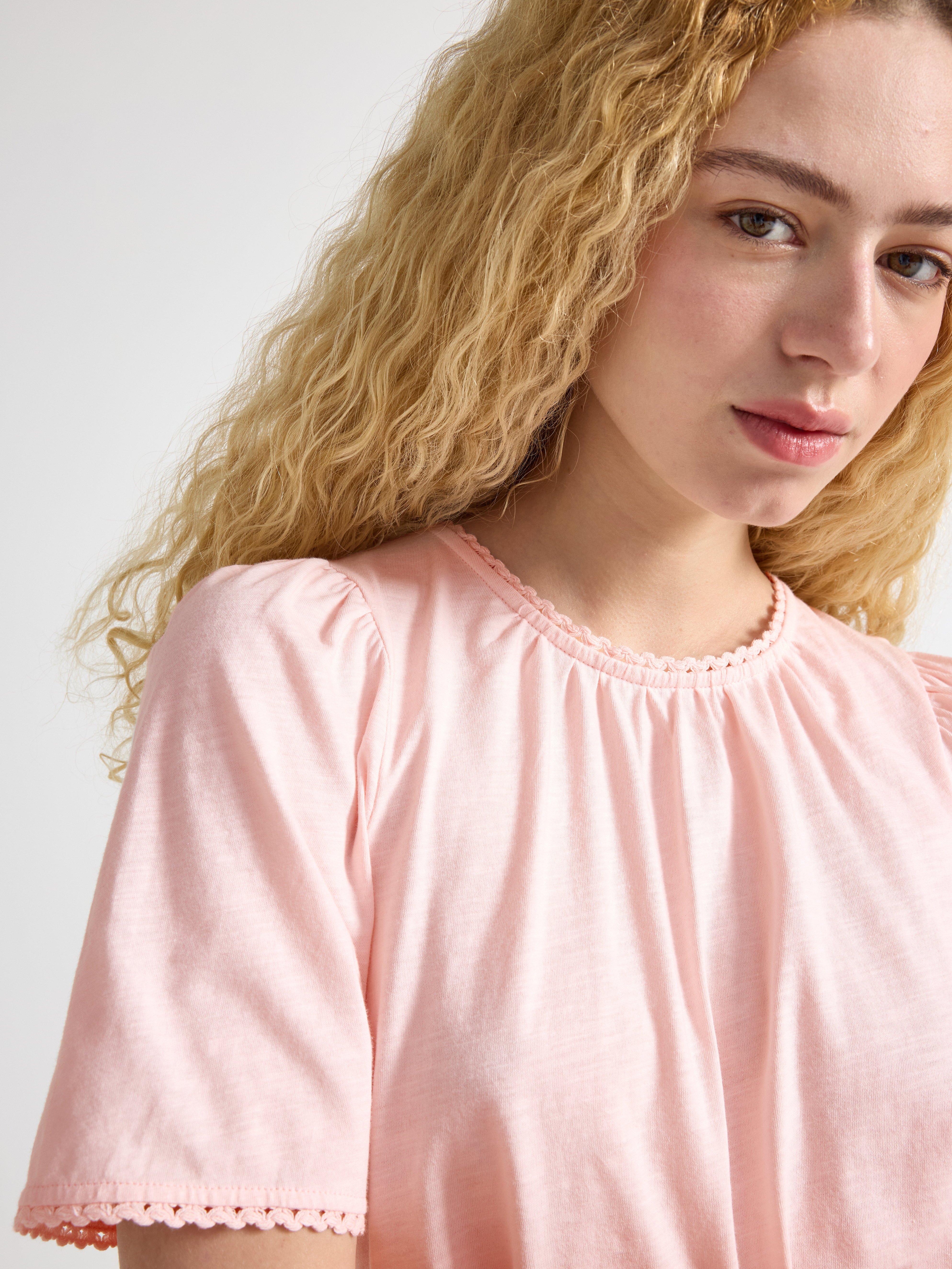 Top de manga corta rosa claro