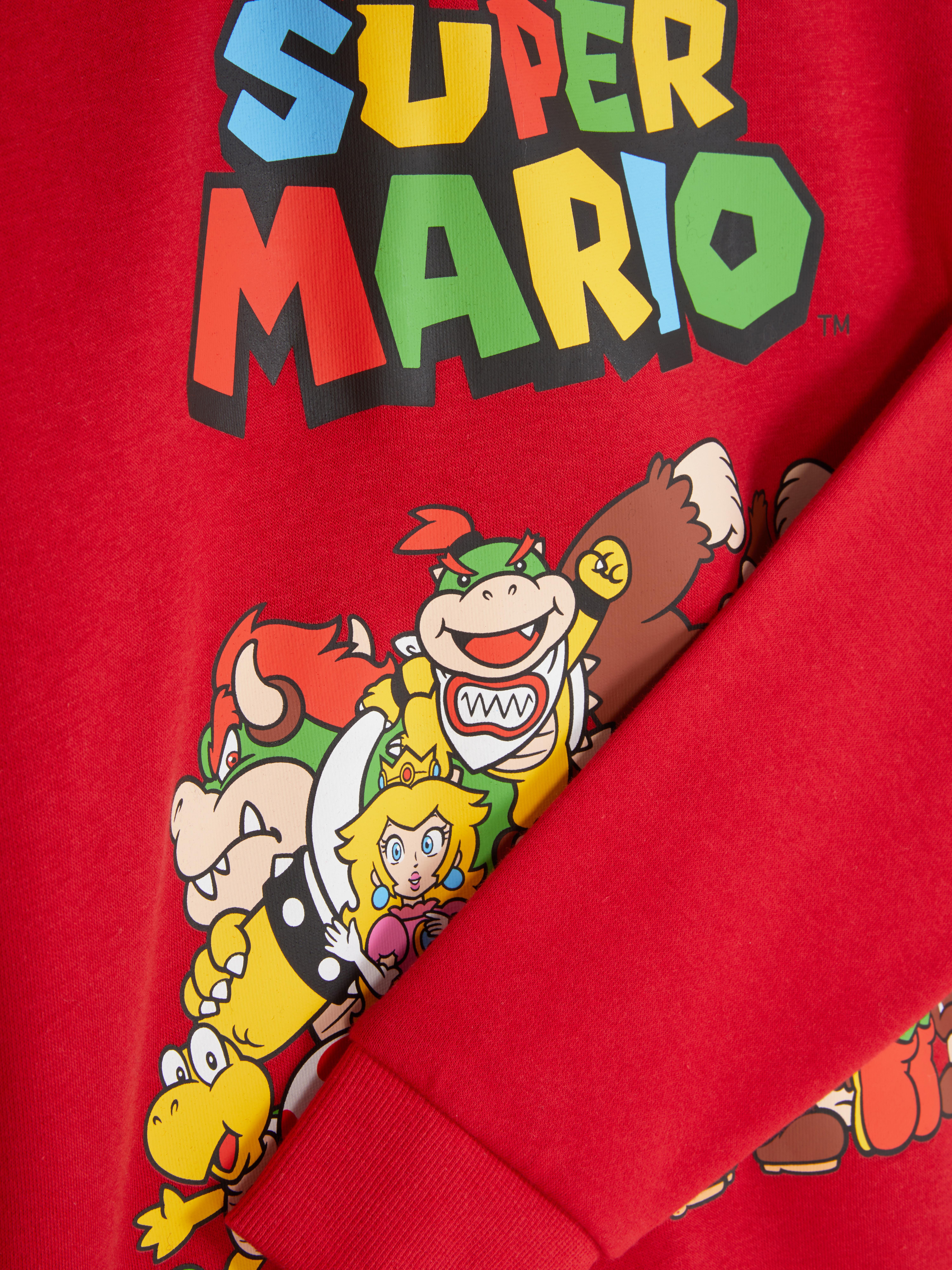 Hanorac cu imprimeu Super Mario Hanorac cu manșete striate și imprimeu Super Mario