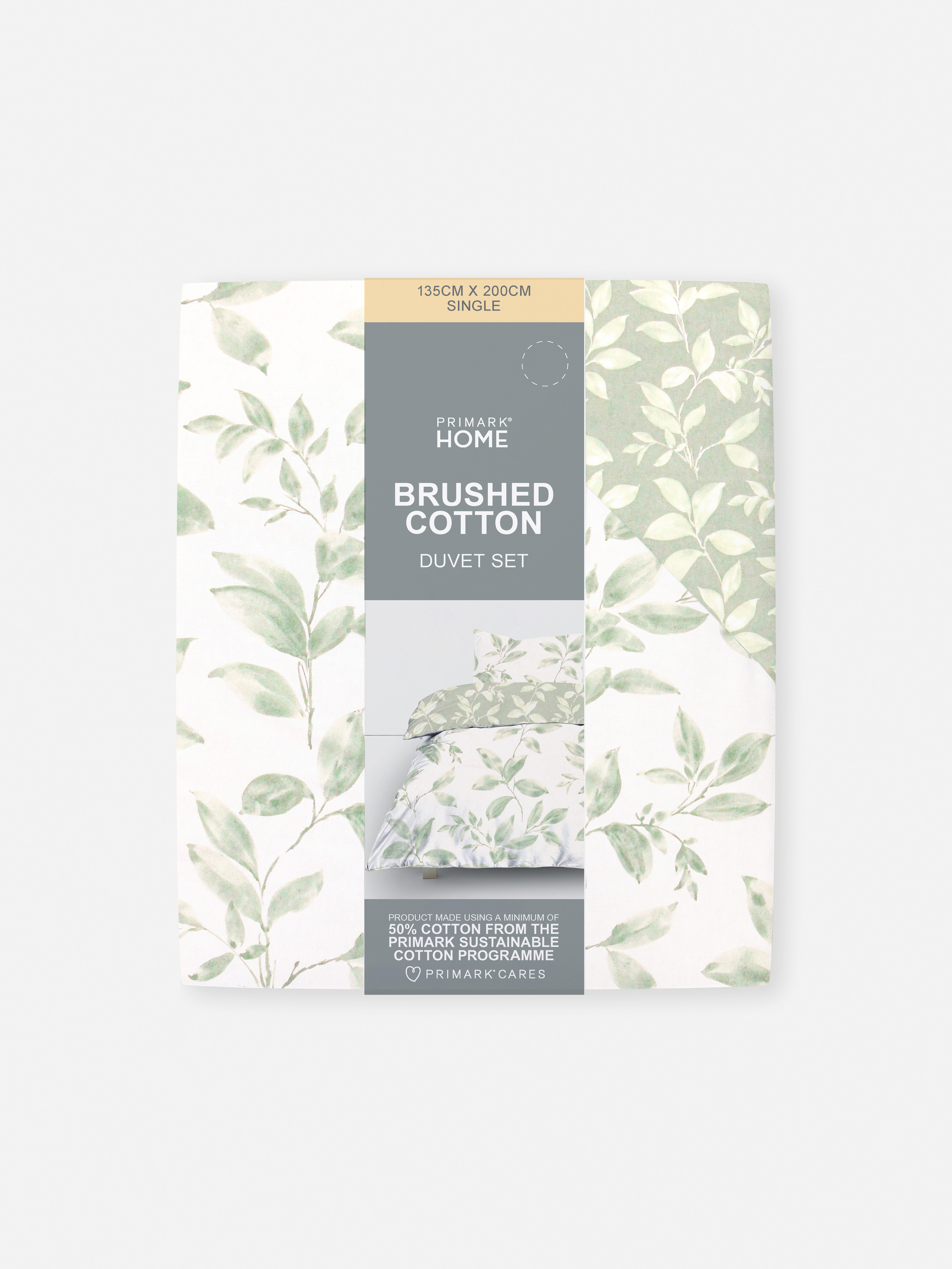 Set de husă de pilotă reversibilă cu motiv de frunze. O husă de pilotă florală cu design reversibil.