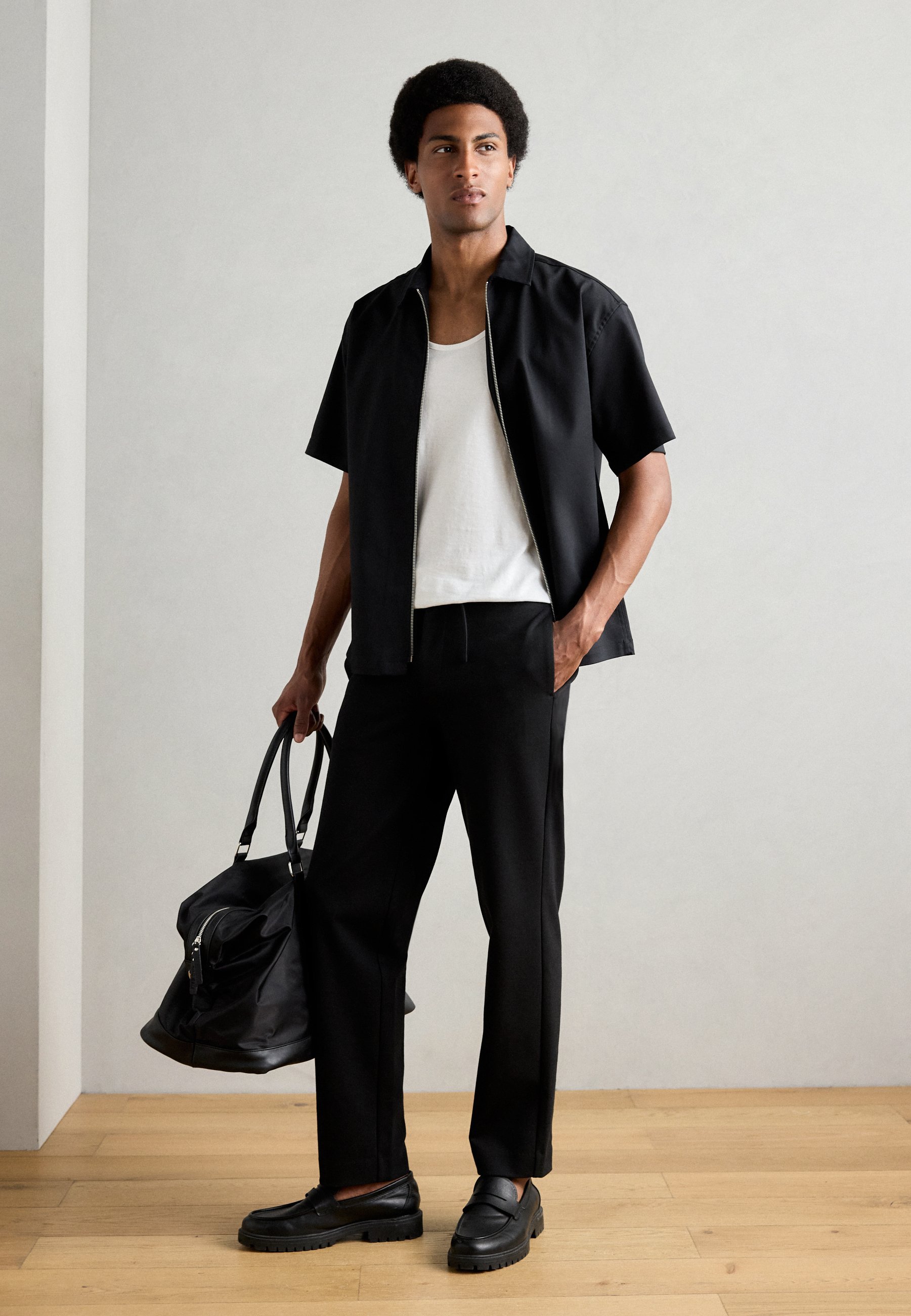 Lindbergh SUPERFLEX RELAXED FIT PANTS - Broek - zwart