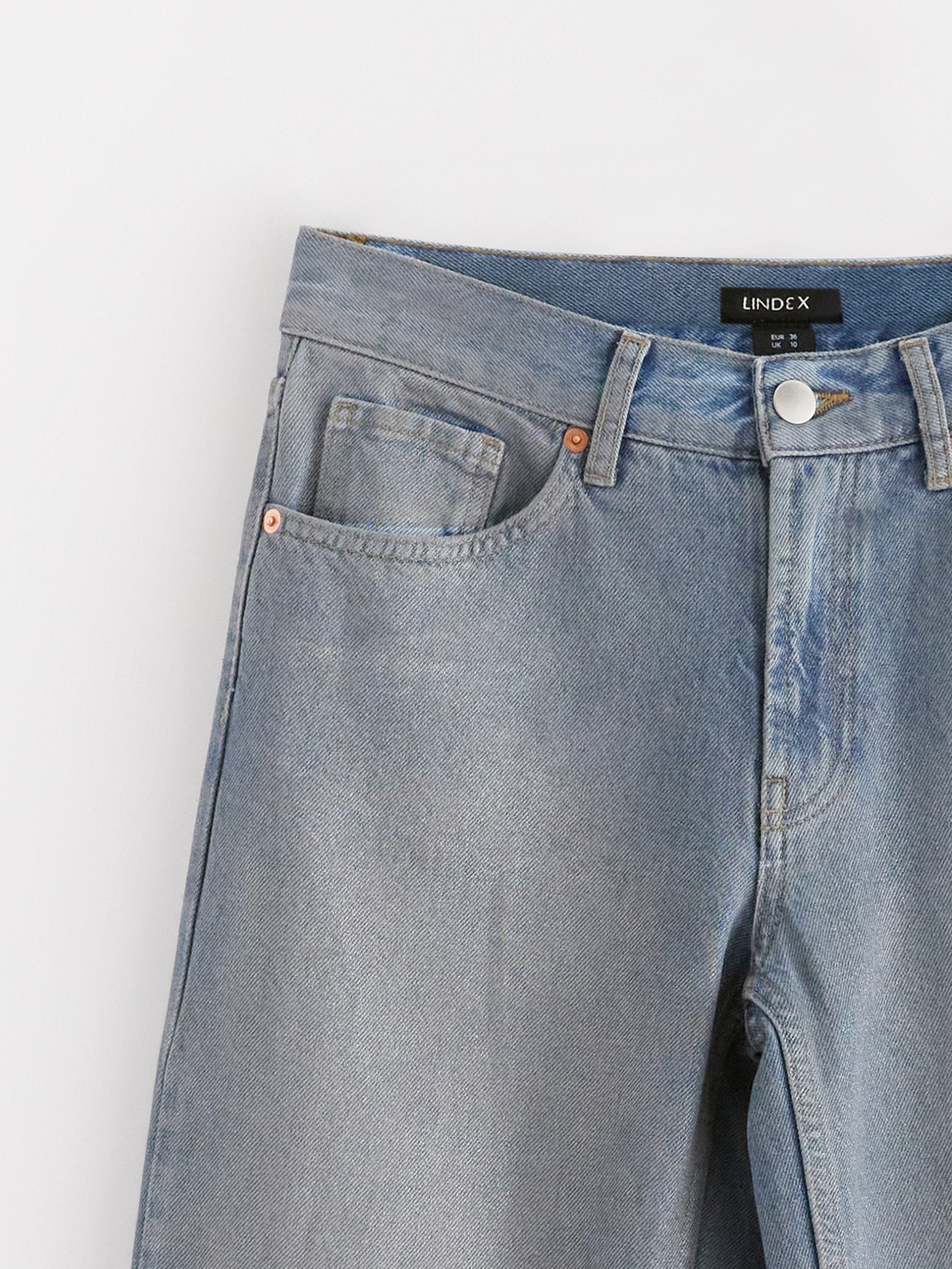 Calça jeans reta Sia extra longa com revestimento em denim azul.