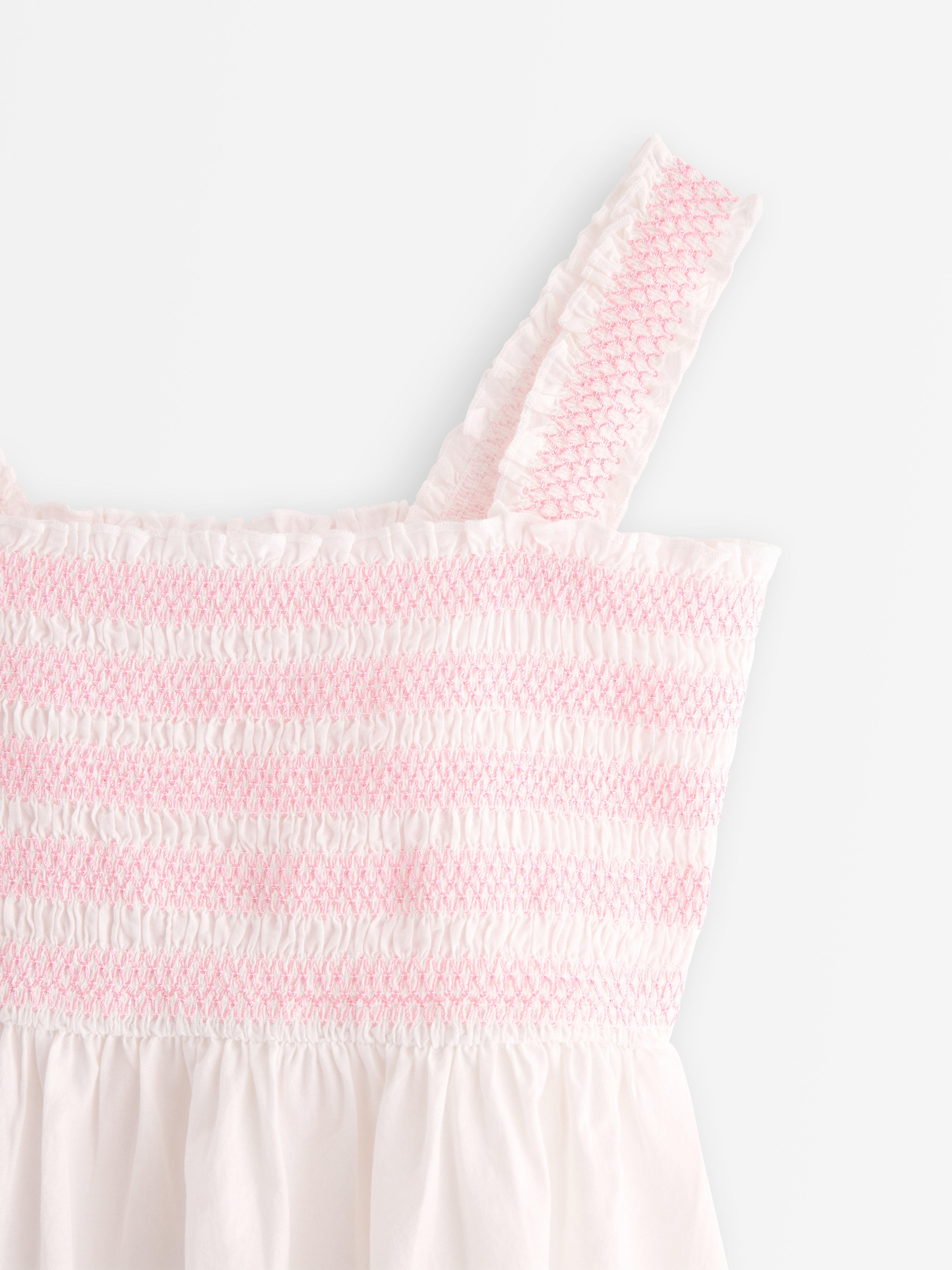 Peplum top med broderi Off White