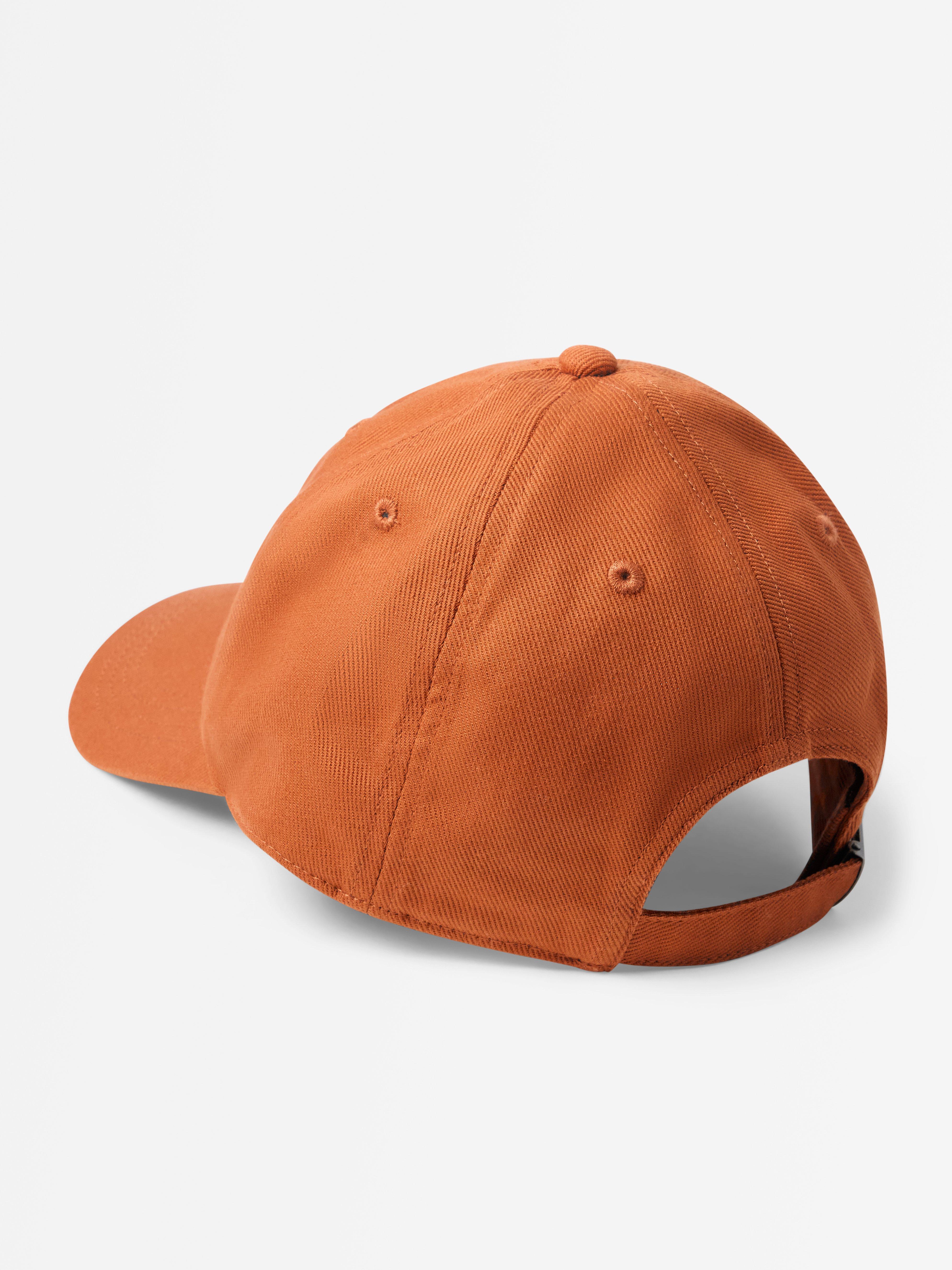 Casquette à visière arrondie orange poussiéreux