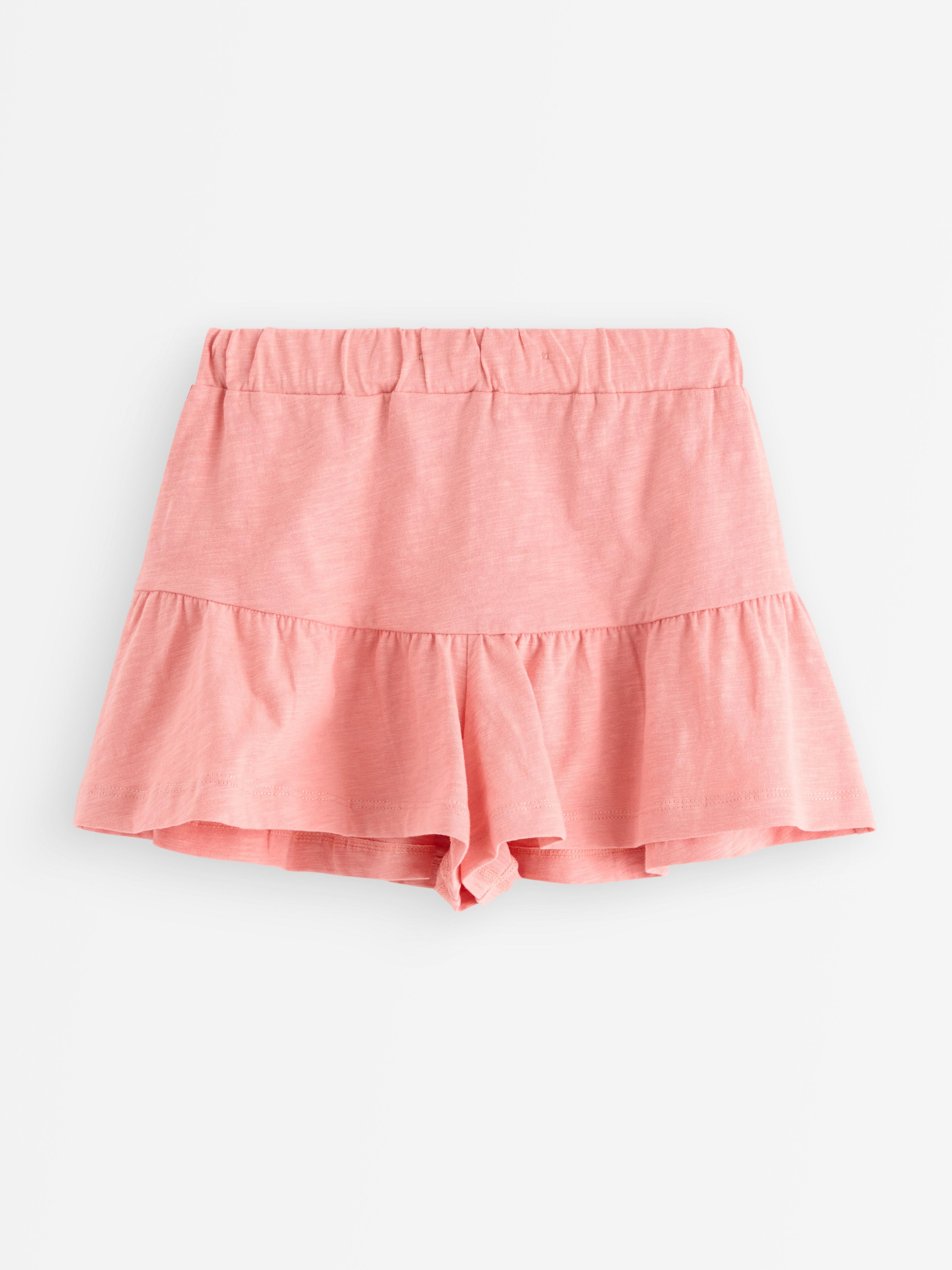 Falda culotte con volantes rosa