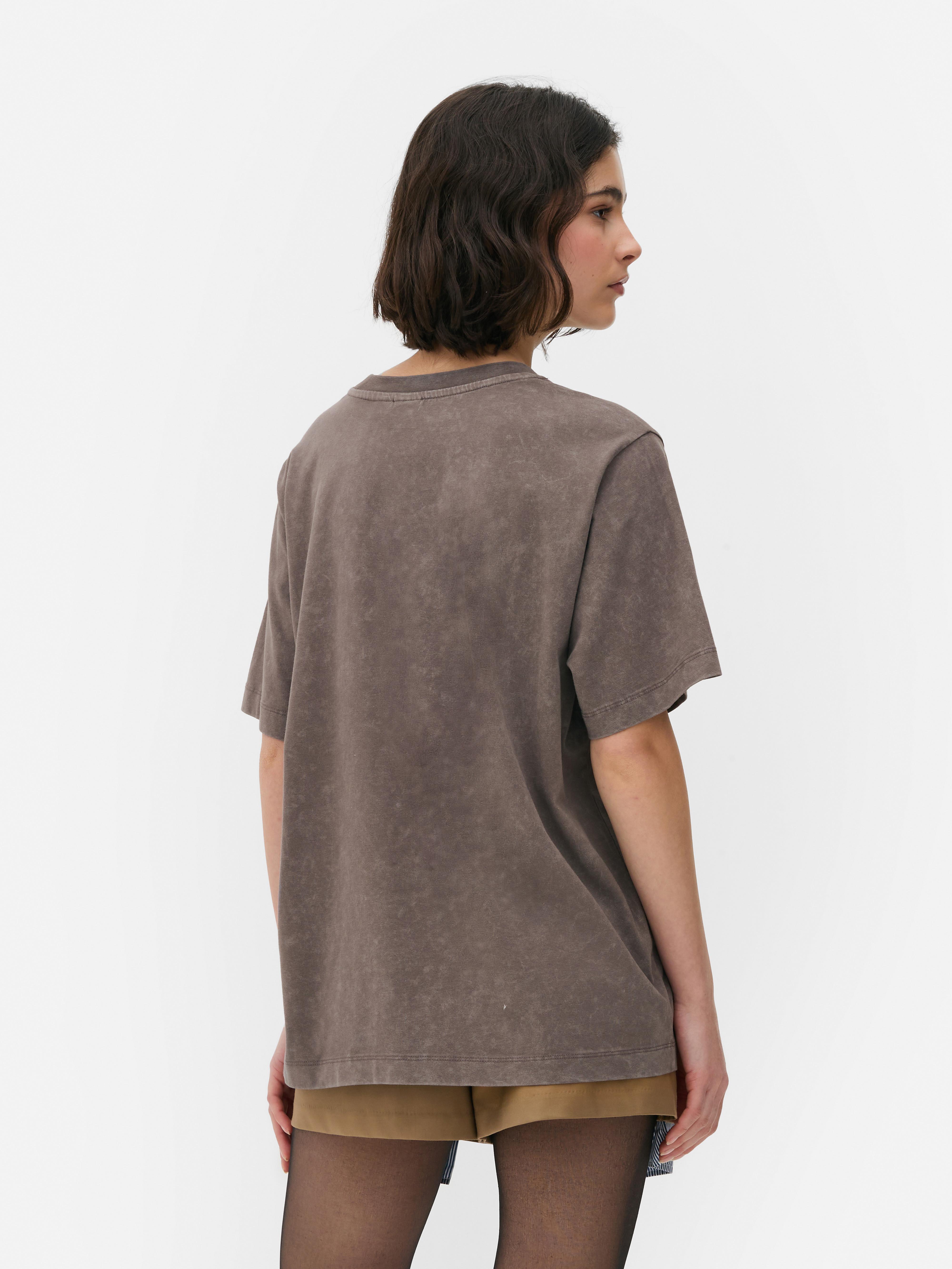 Tricou cu mânecă scurtă Nirvana Un tricou cu mânecă scurtă și orificii pentru ochiuri