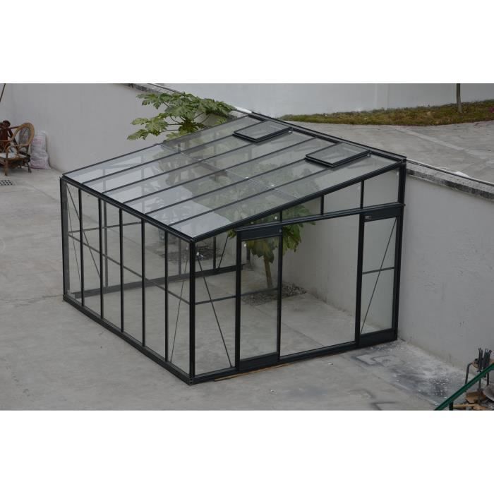 Invernadero/jardín de invierno gris de 12 m² con base adosada.
