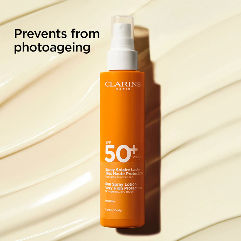 Protetor solar em spray Clarins Sun Care para o corpo e rosto.