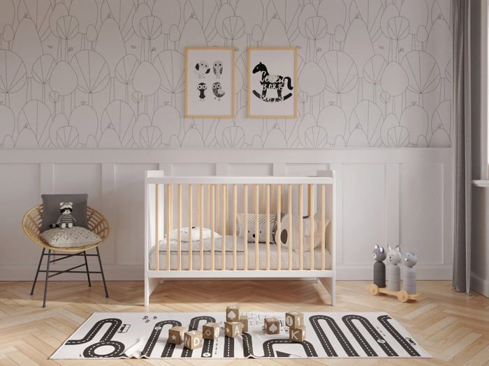Omvormbaar babybedje van wit grenenhout, 120x60 cm. Het babybedje kan worden omgevormd tot een slaapbank met een veiligheidsrail.