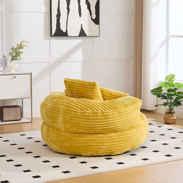 Comoda poltrona a sacco con tre cuscini, 108 x 108 x 52 cm. Divano relax per soggiorno e camera da letto. Poltrona in velluto a coste. Colore giallo.