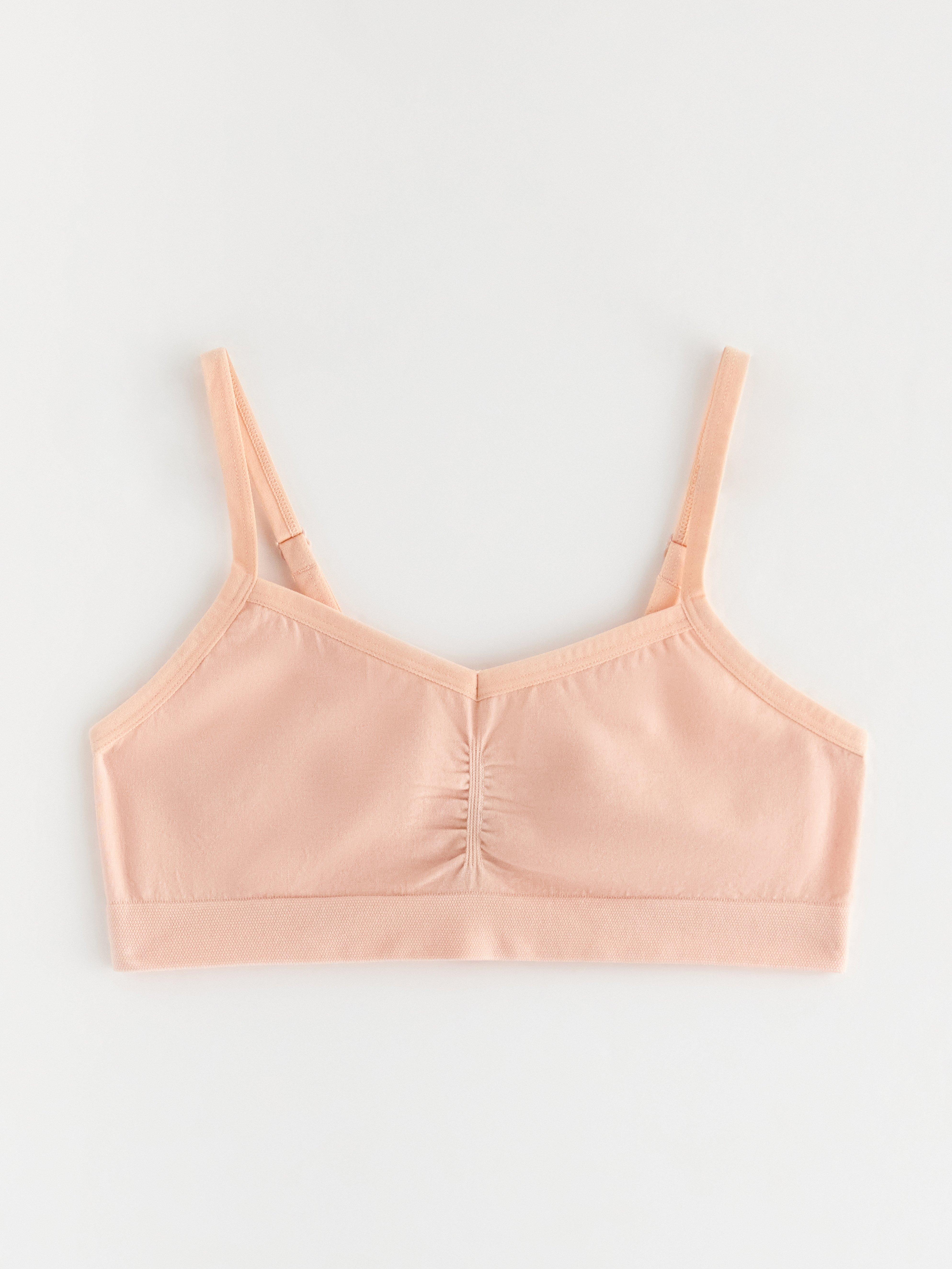 Bezešvý crop top světle zaprášeně růžový