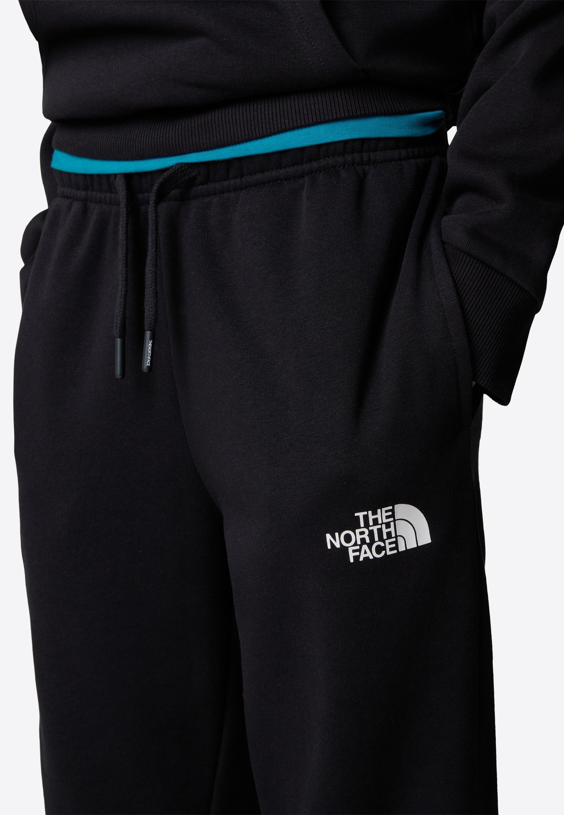 Pantaloni da jogging affusolati The North Face REGULAR TAPERED UNISEX - Pantaloni della tuta - tnf nero