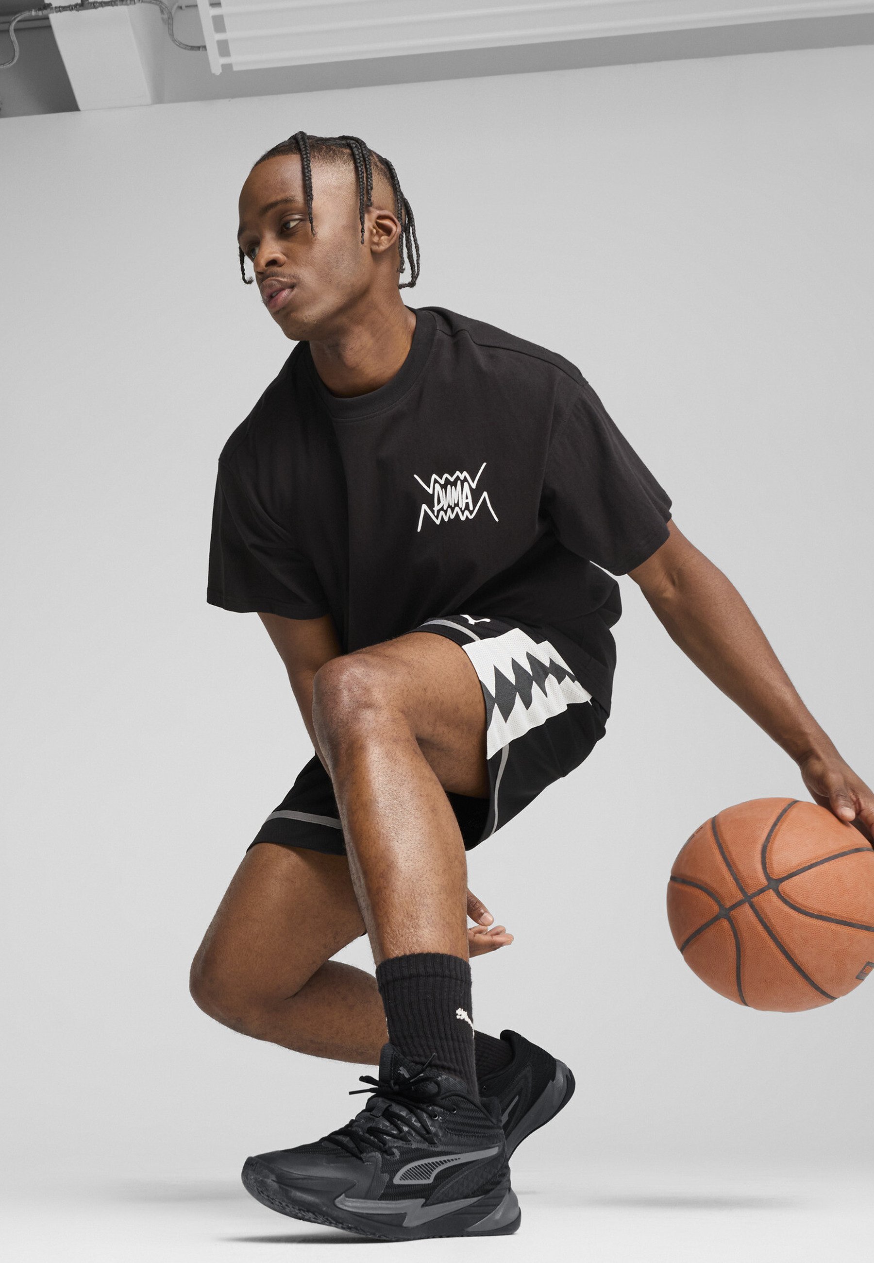 T-shirt de sport Puma JAWS CORE - noir