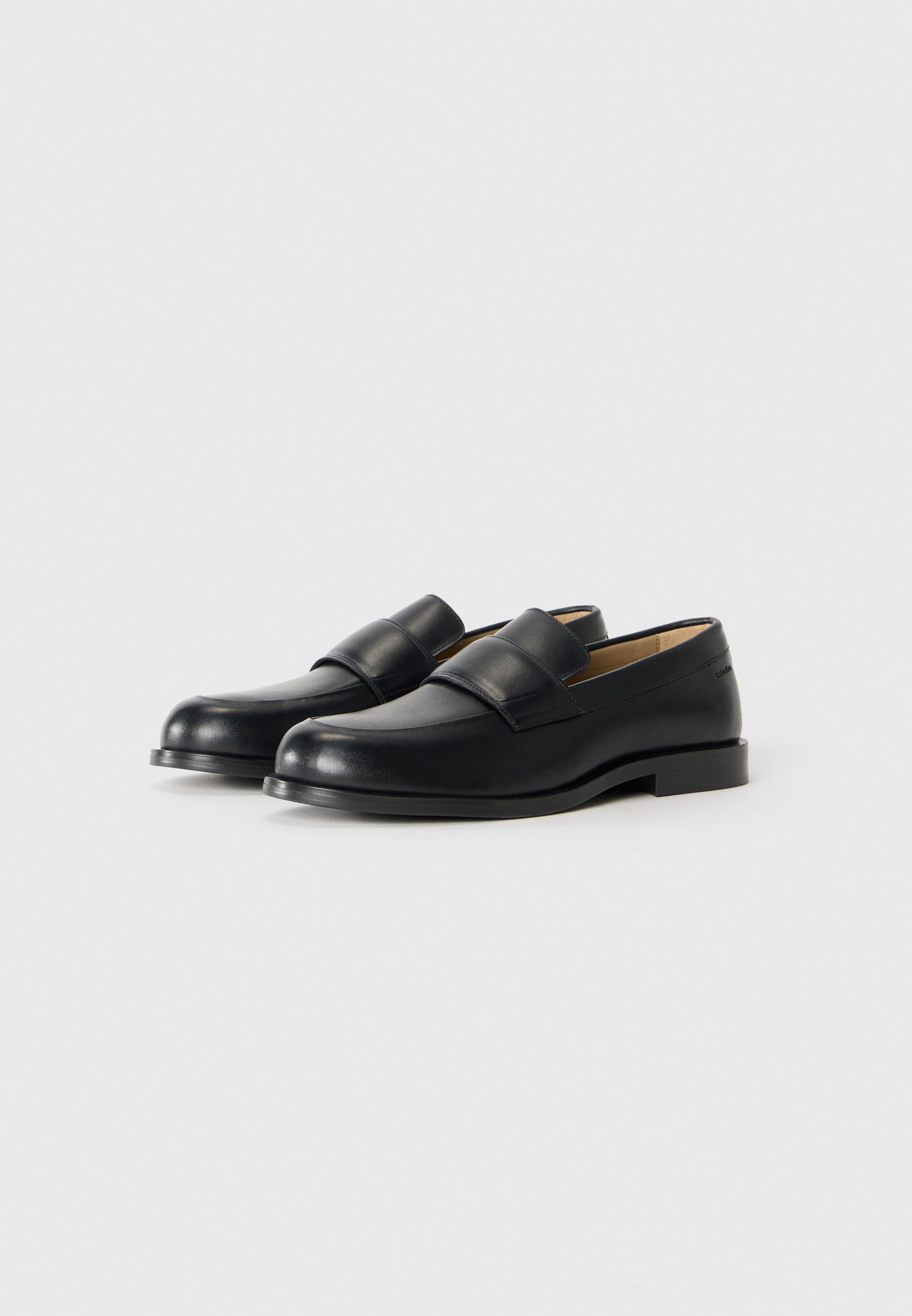 Calvin Klein Slip-ons - trippel svart