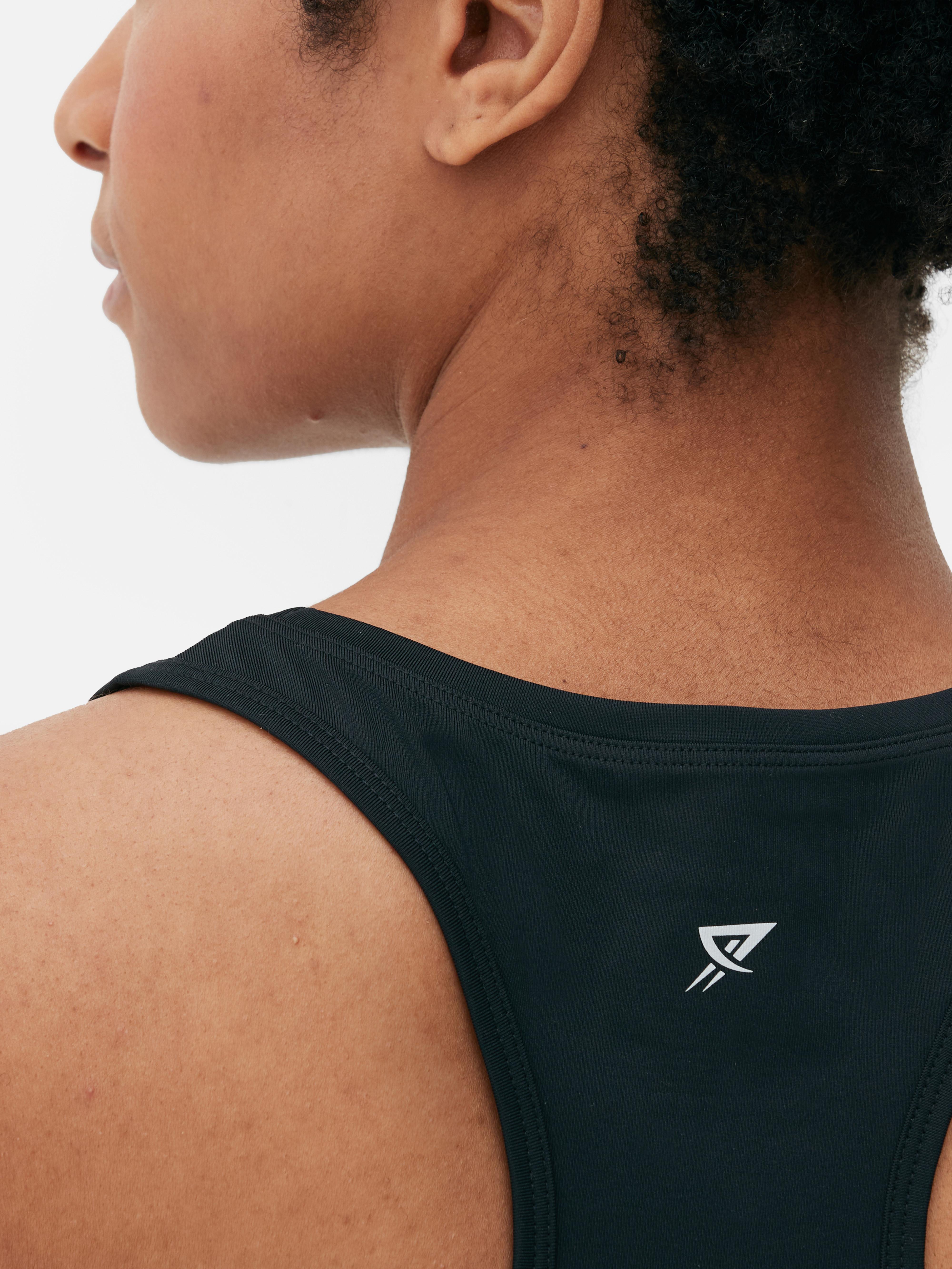 Racerback sportfelső Jógaóráktól sportfoglalkozásokig: ez a racerback felső minden edzéshez a kedvenced.