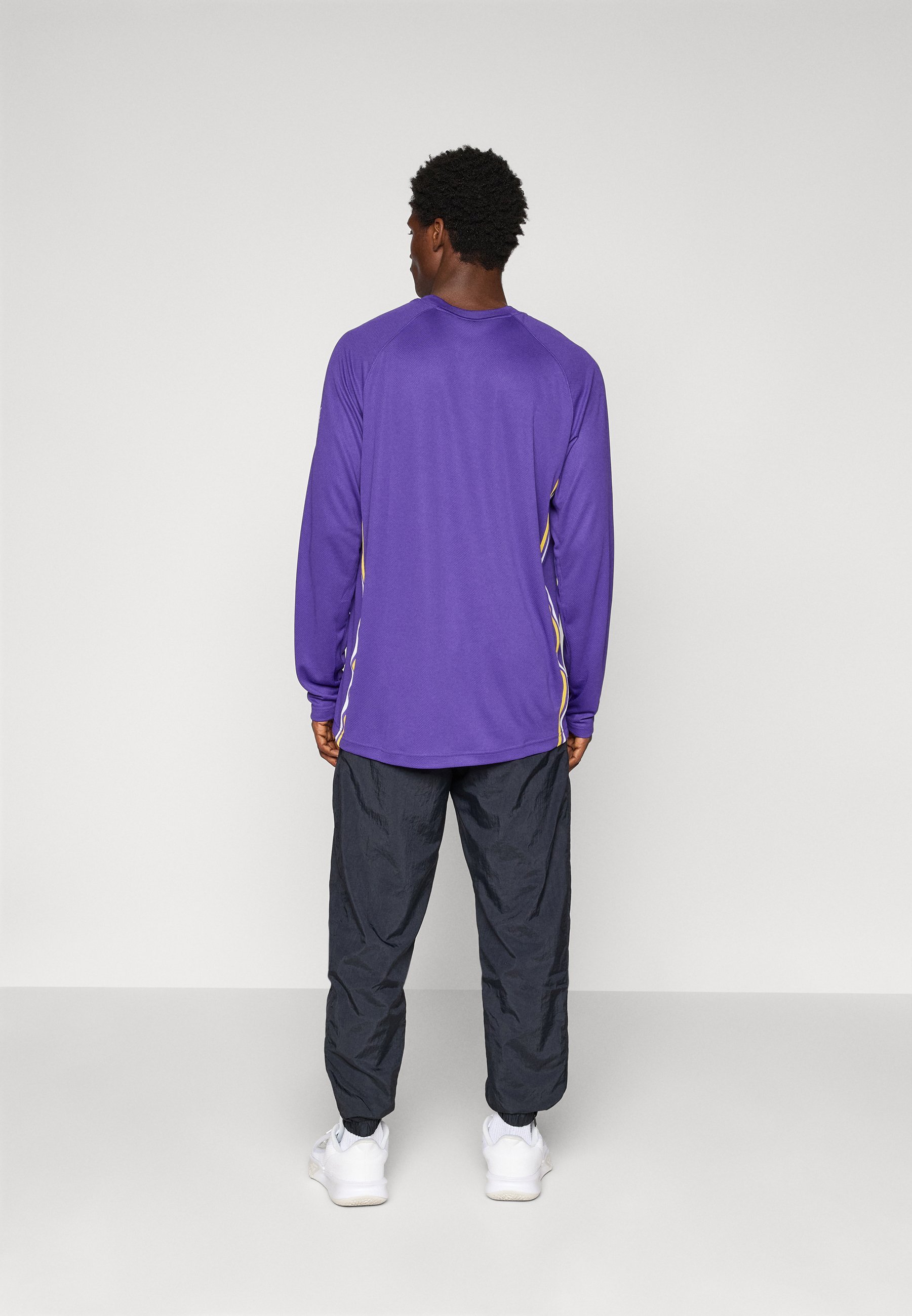 Pantaloni da tuta Nike Performance LOS ANGELES LAKERS - nero/velluto