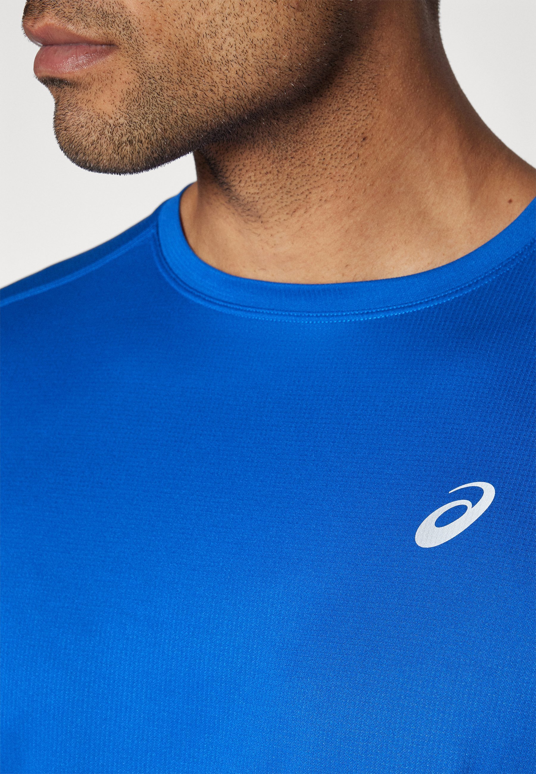 ASICS CORE TOP - Sport T-shirt - blauw