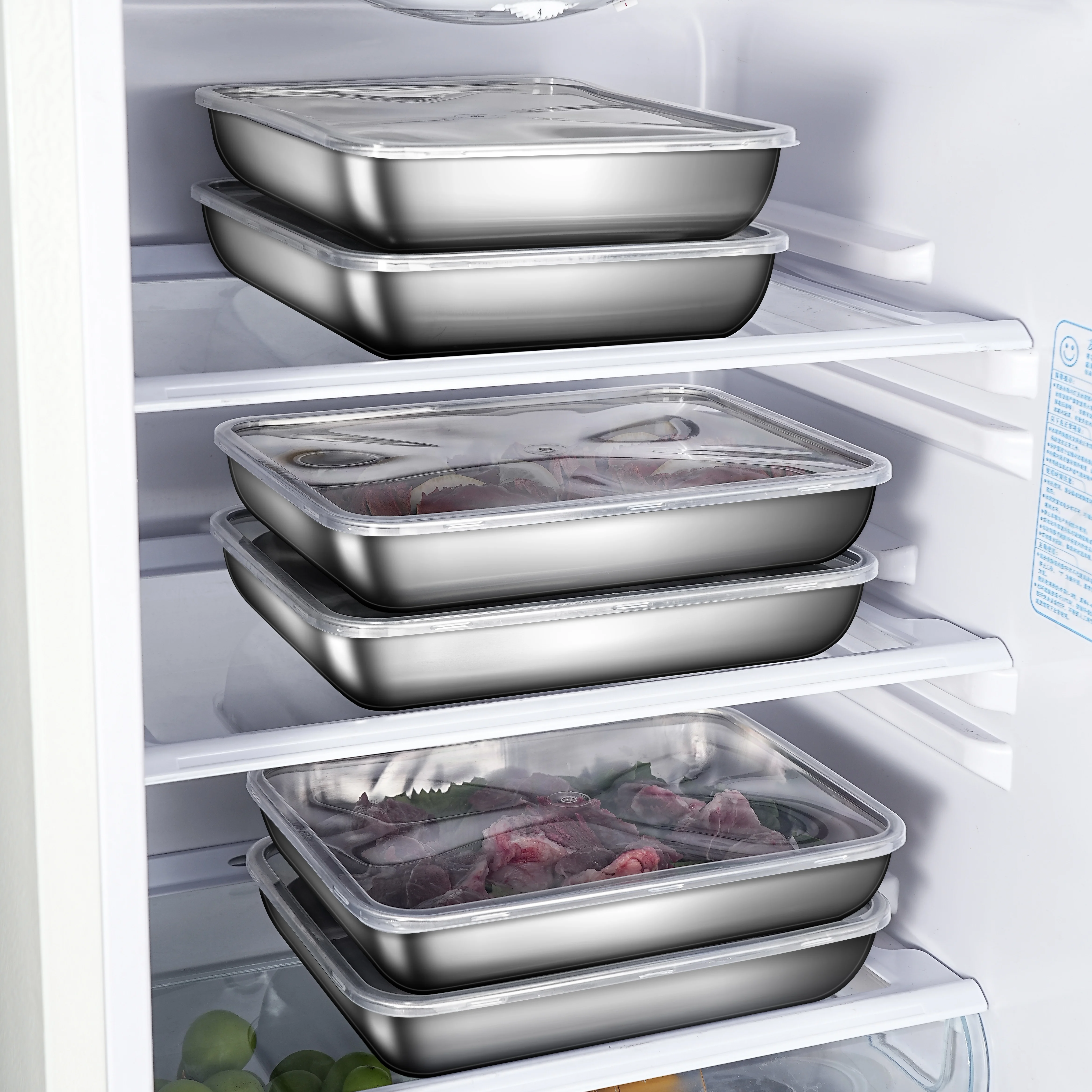 Boîte de conservation alimentaire en acier inoxydable avec couvercle, idéale pour conserver les légumes, les fruits et les ustensiles de cuisine.