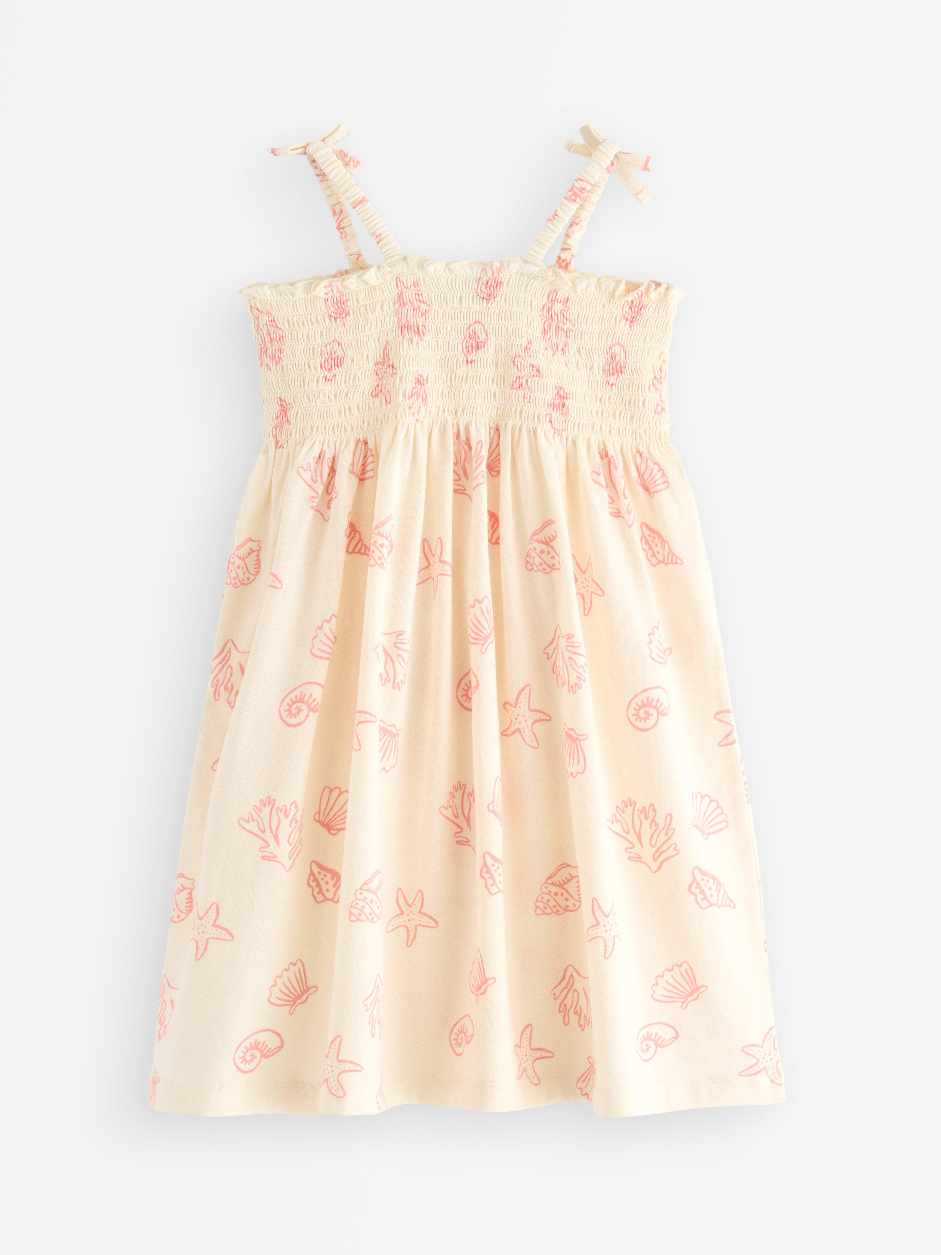 Robe blanche sans manches