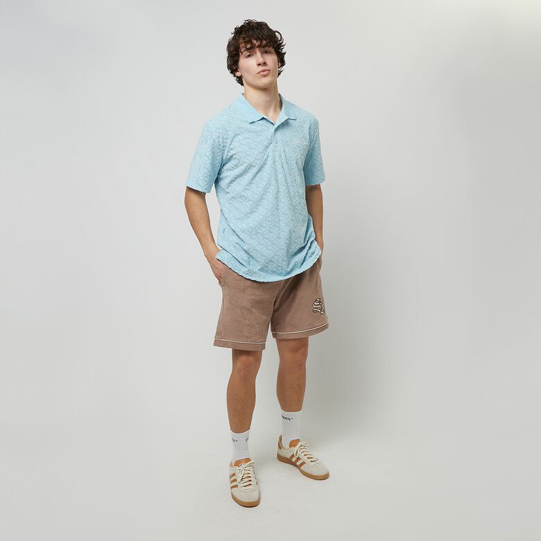 Fluwelen poloshirt van Devorée met monogramlogo