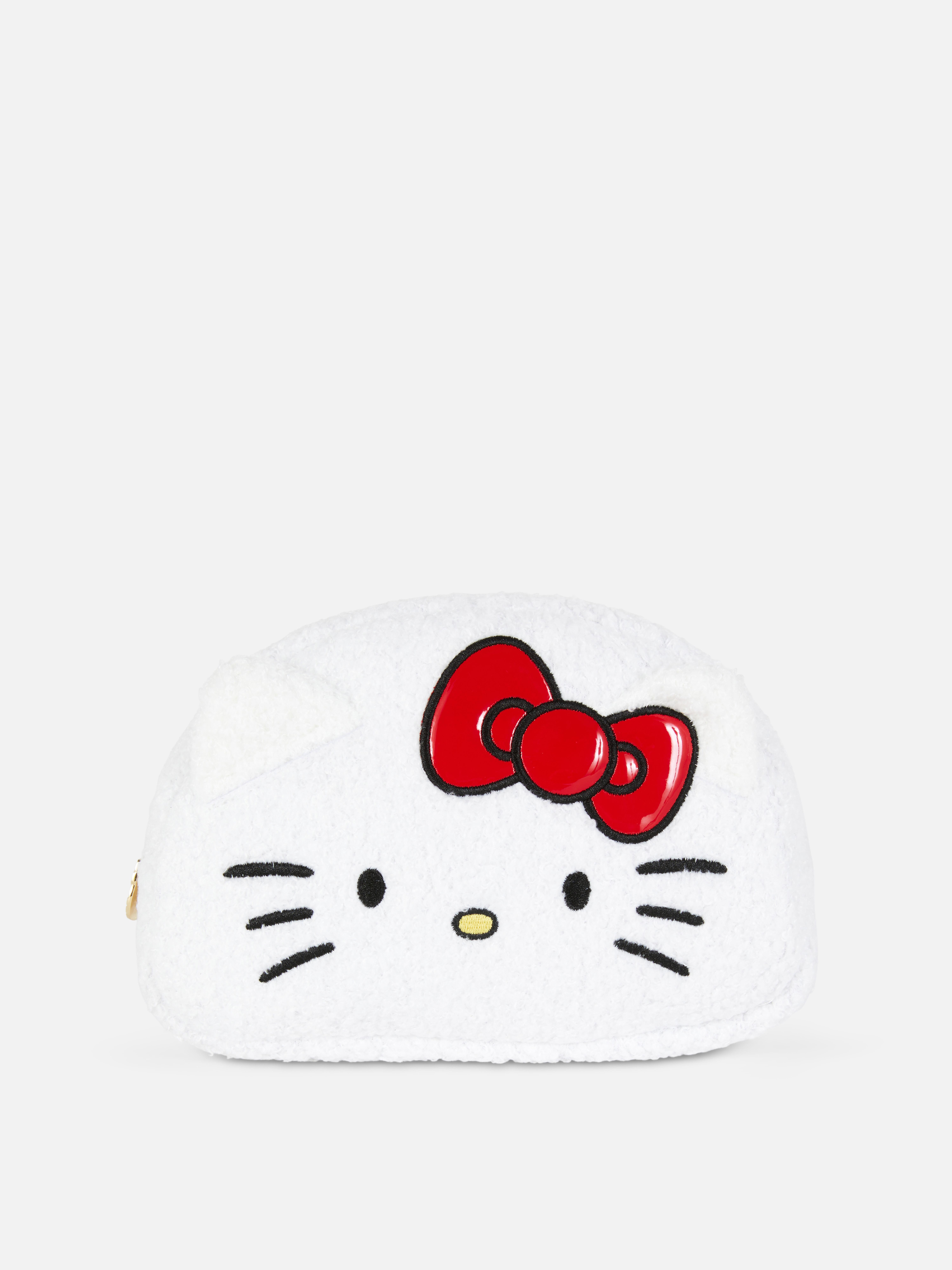 Geantă de machiaj de pluș Hello Kitty and Friends O geantă de machiaj de pluș cu fermoar metalic și design Hello Kitty cu urechi