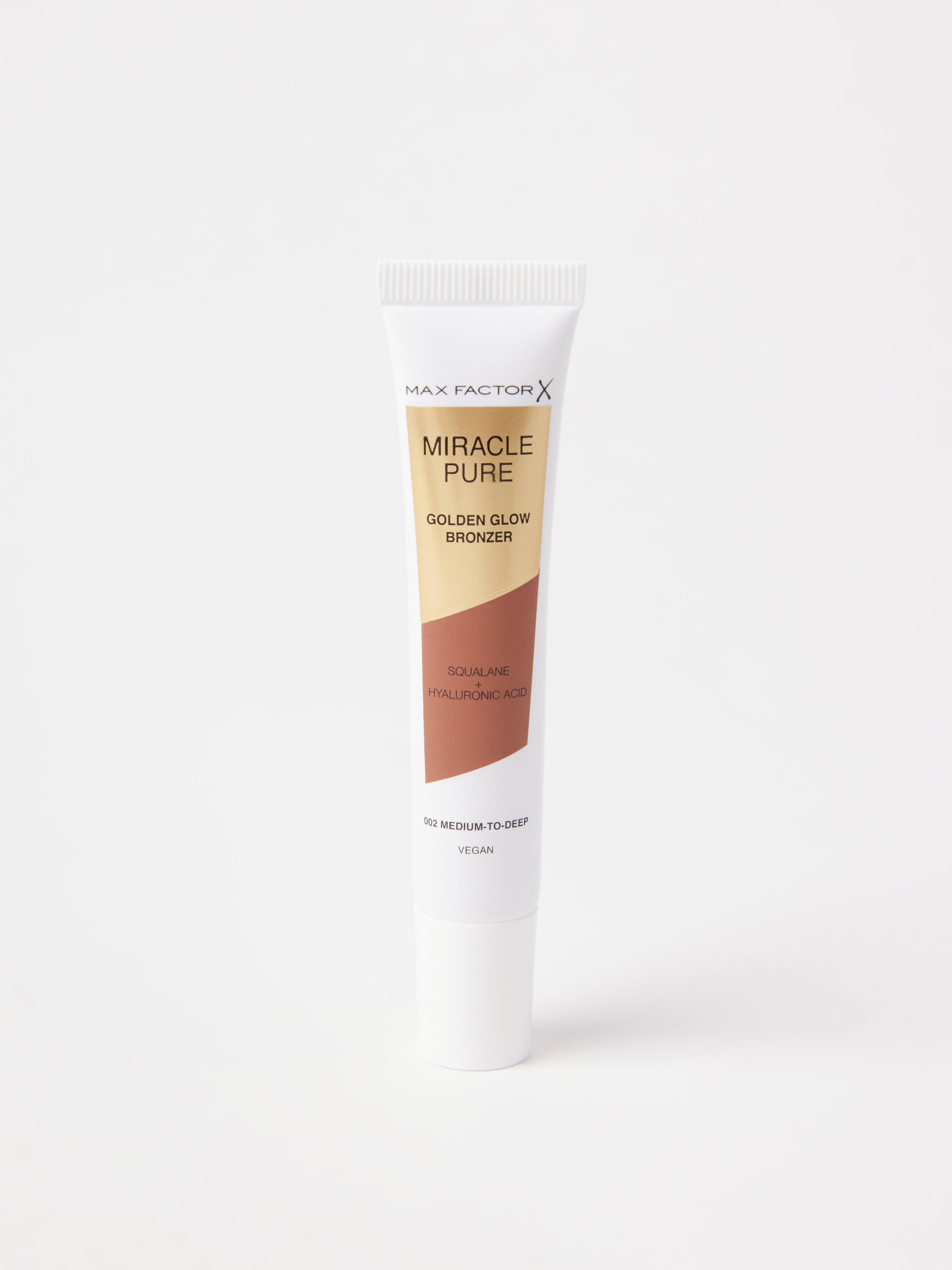 Bronceador Max Factor Miracle Pure Golden Glow 002, tono medio a oscuro