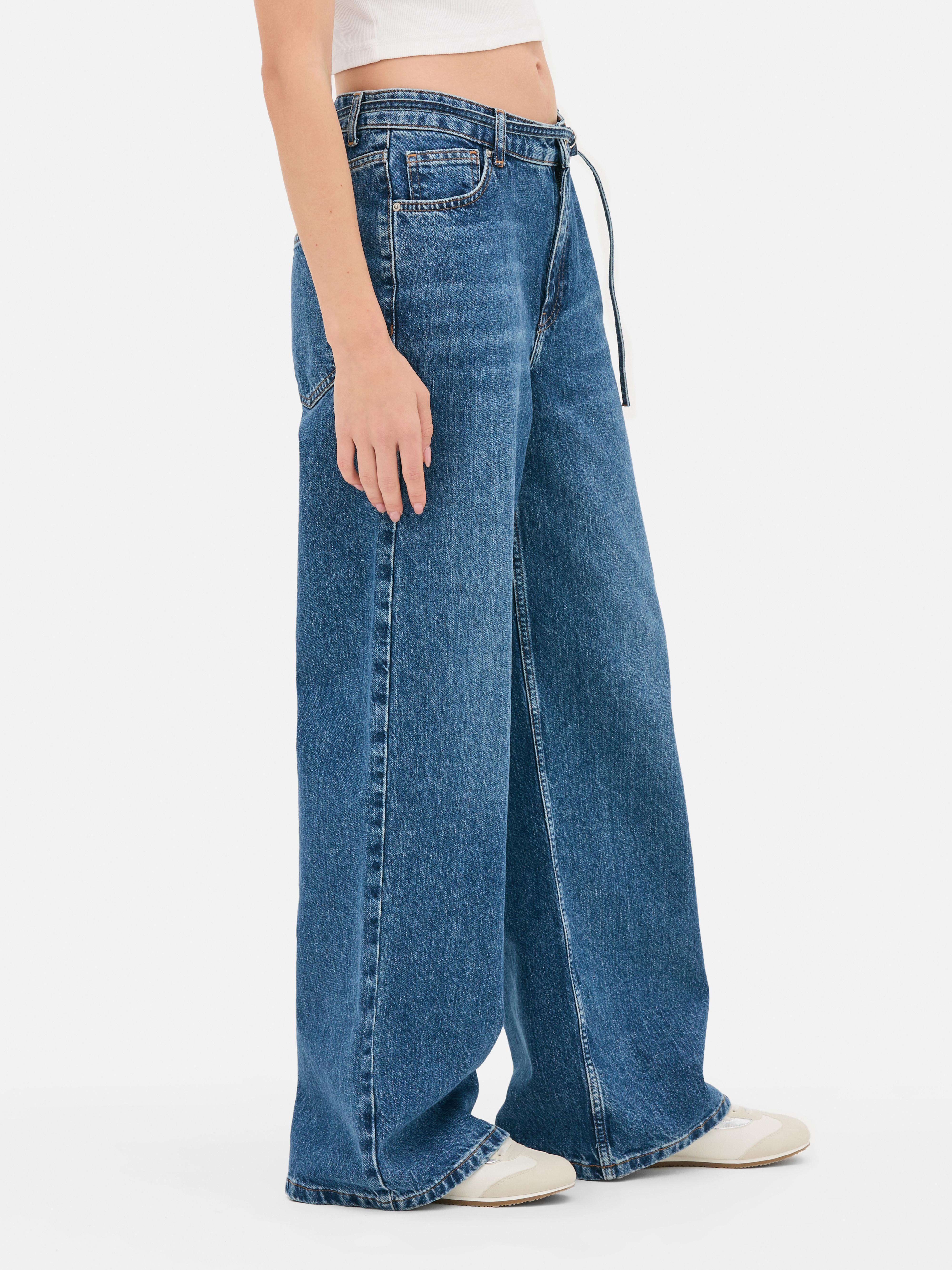 Blugi cu croială lată și curea cu inel D. Blugi din denim cu o siluetă lată și curea cu inel D.