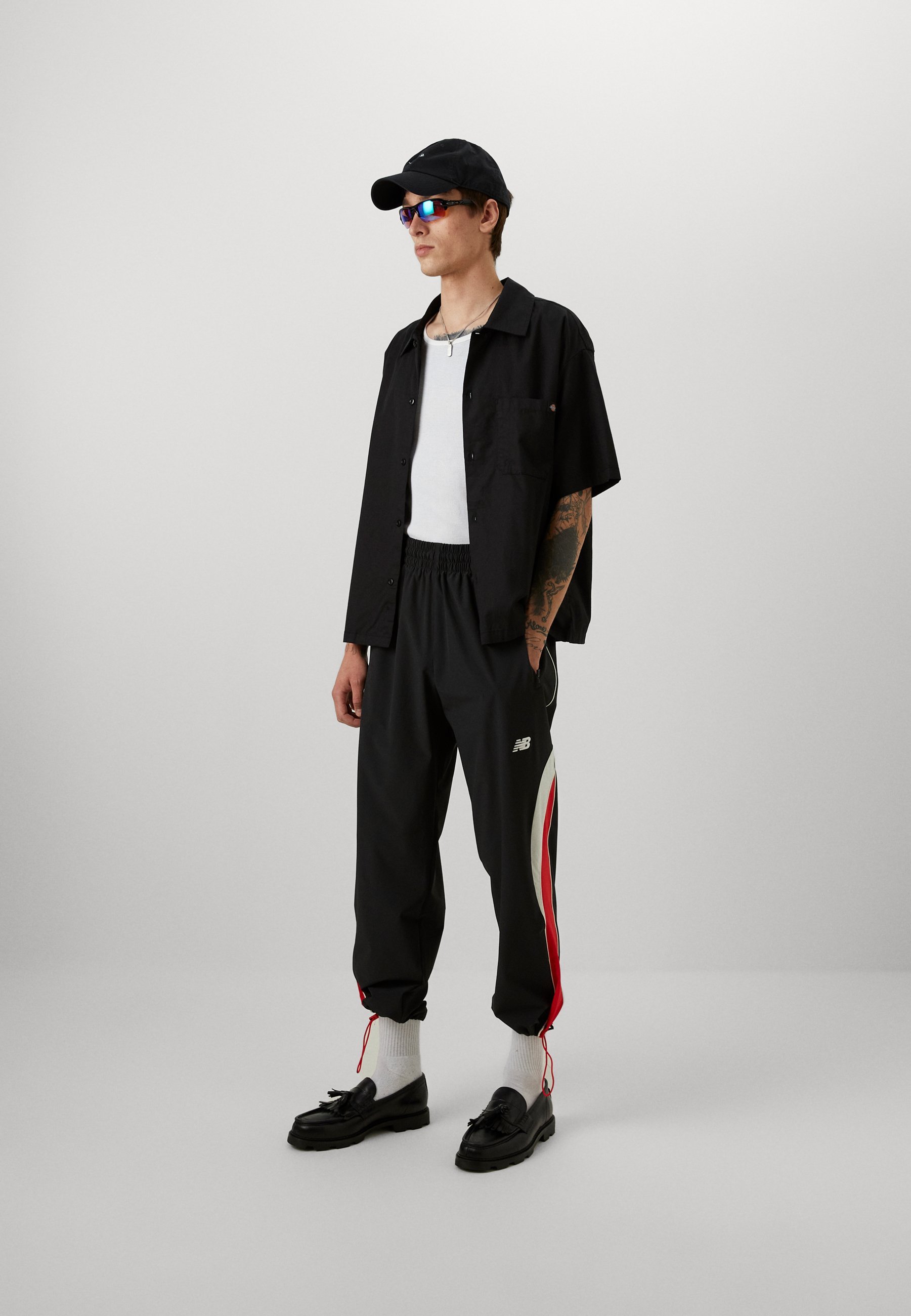 Pantaloni da tuta New Balance IN GAME - neri