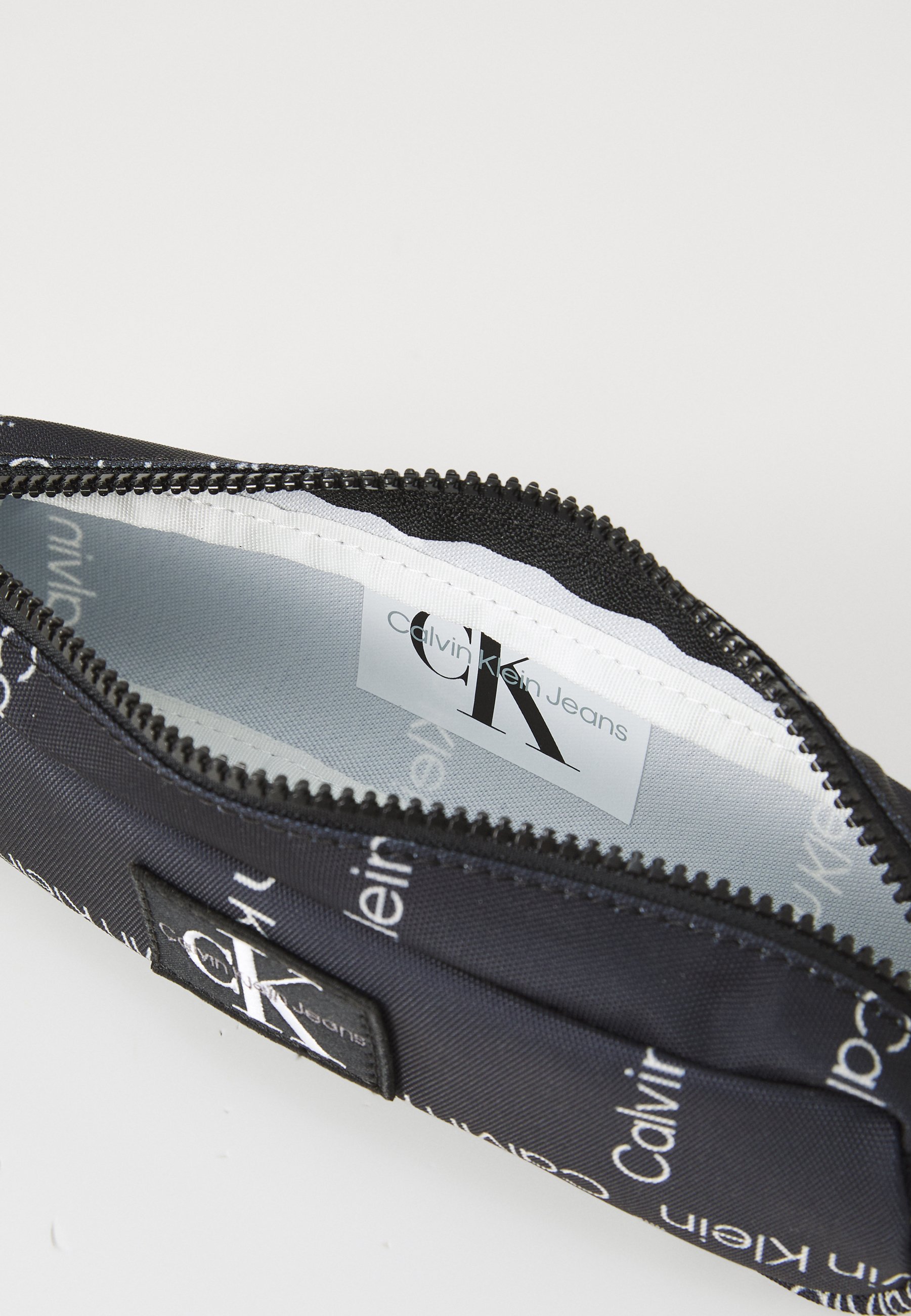 Calvin Klein Jeans CITY GRID ETUI UNISEX - Etui - zwart