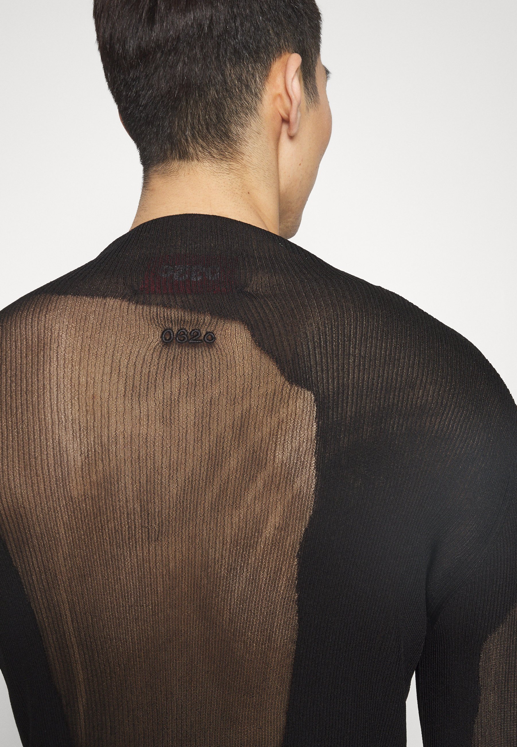 Pull à col roulé transparent 032c - noir