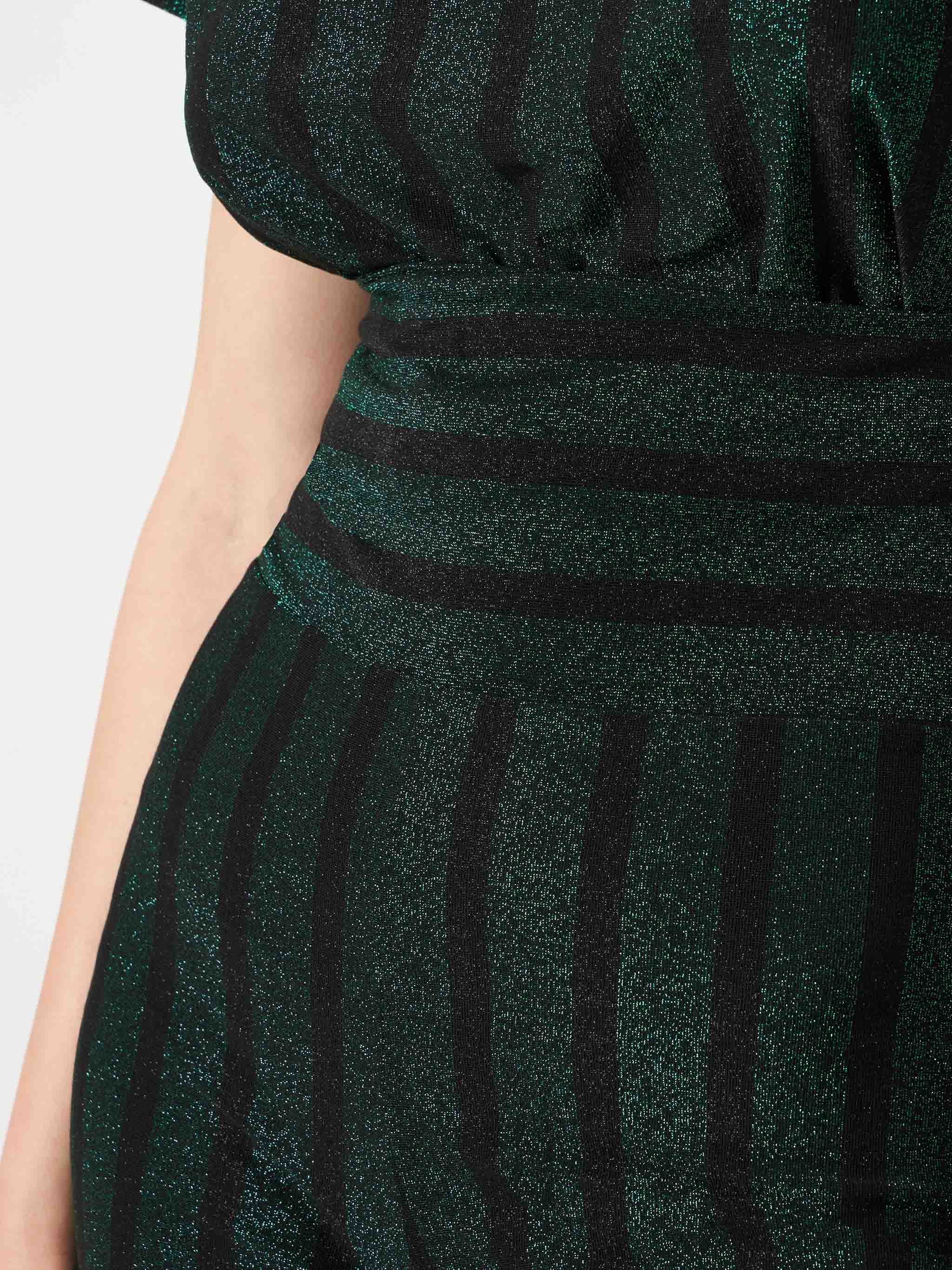 Paleisbroek met zwarte en groene glitterstrepen
