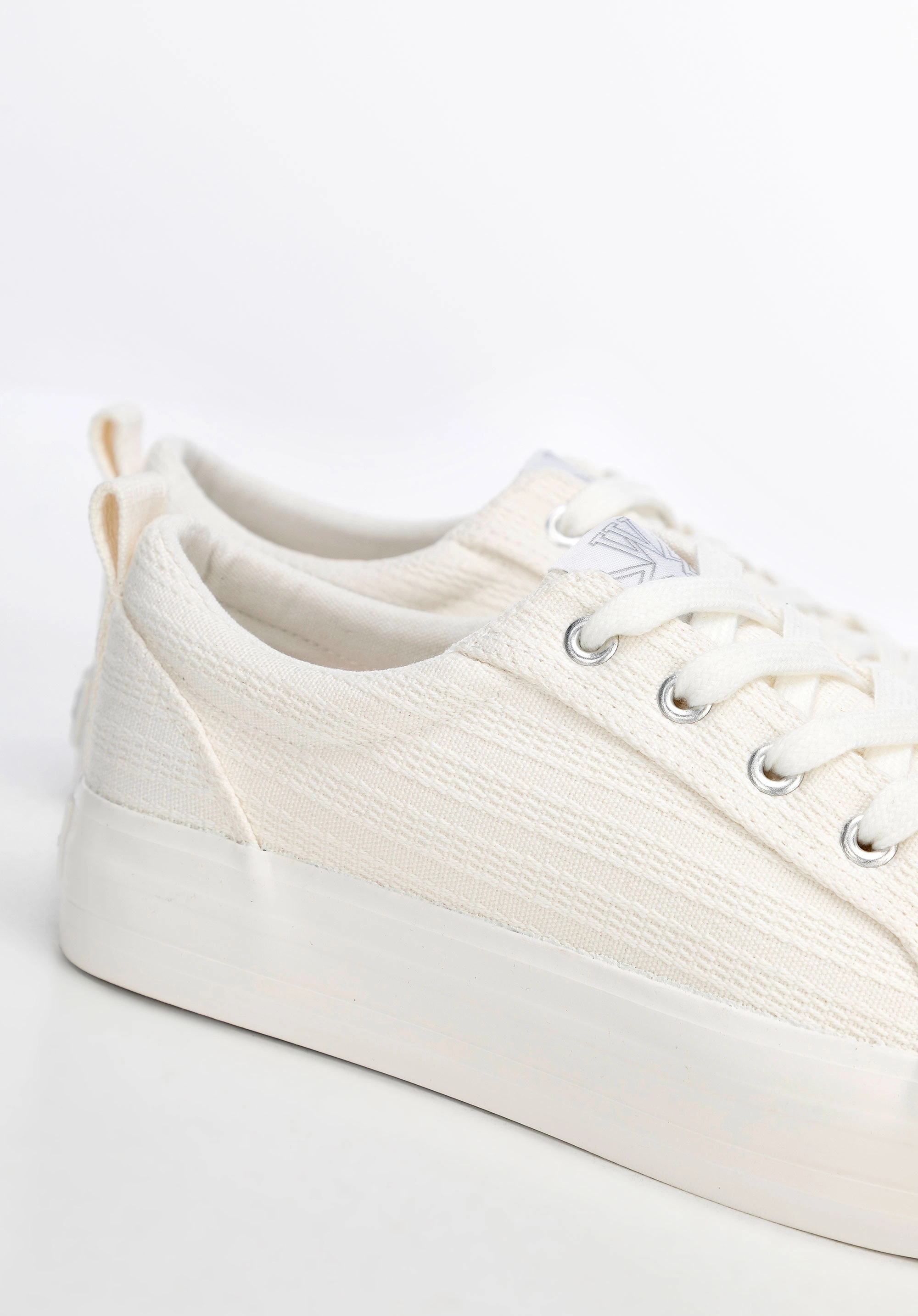 Damskie sneakersy na platformie kremowe