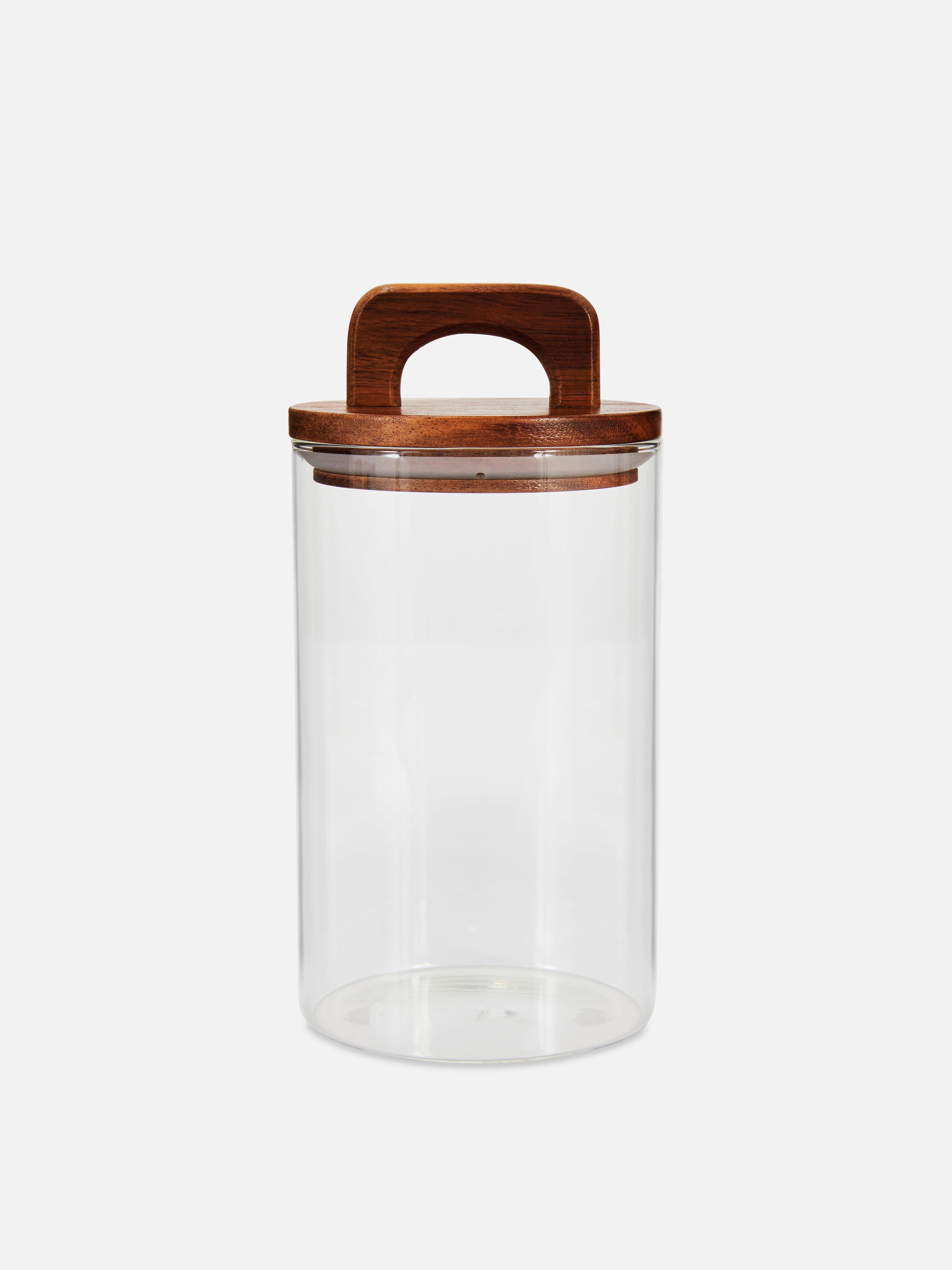 Mittelgroßes Einmachglas mit Holzdeckel. Endlich mehr Stauraum in Ihrer Küche dank dieses Einmachglases.