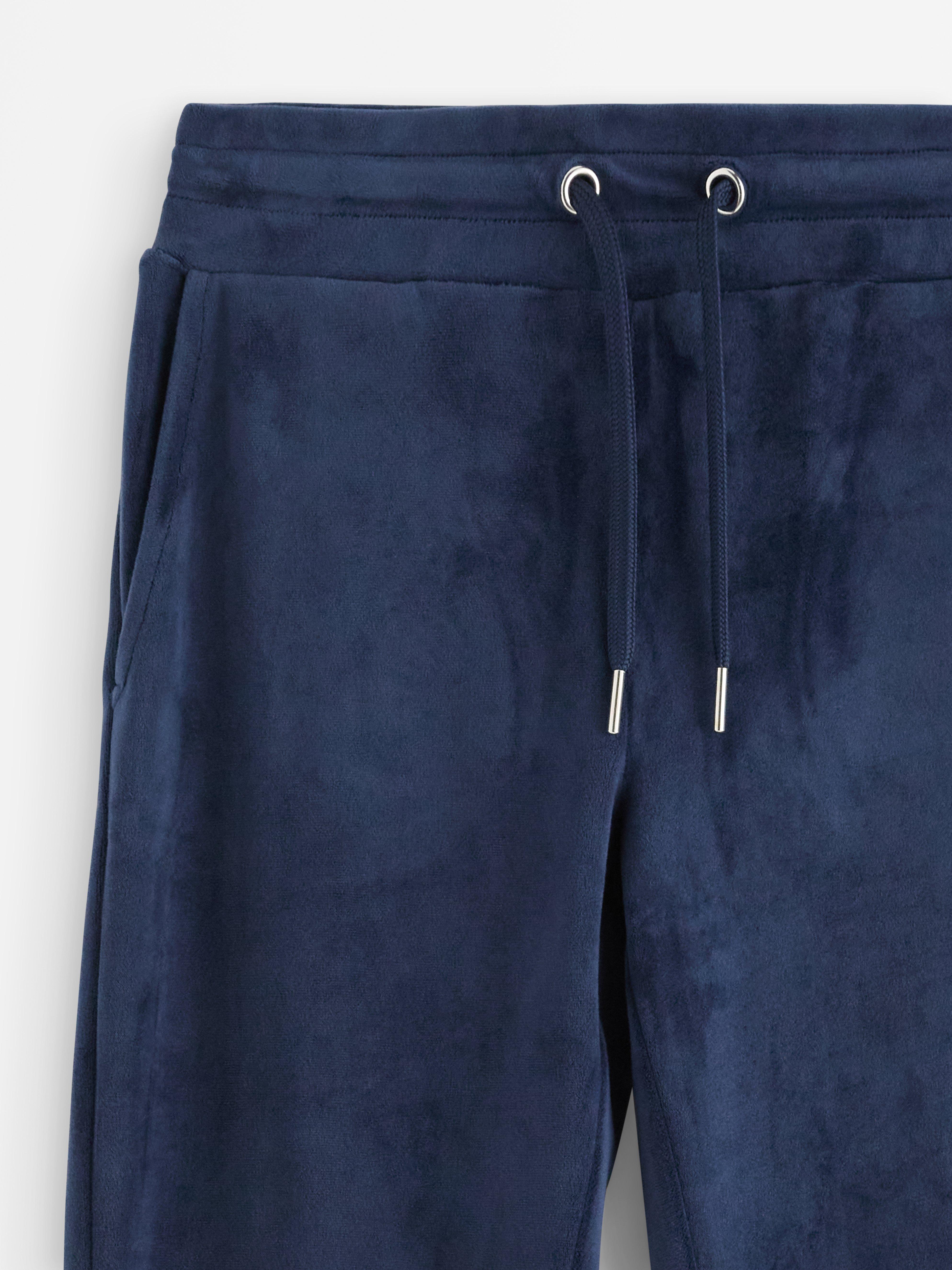 Utsvingte bukser i marineblå velour