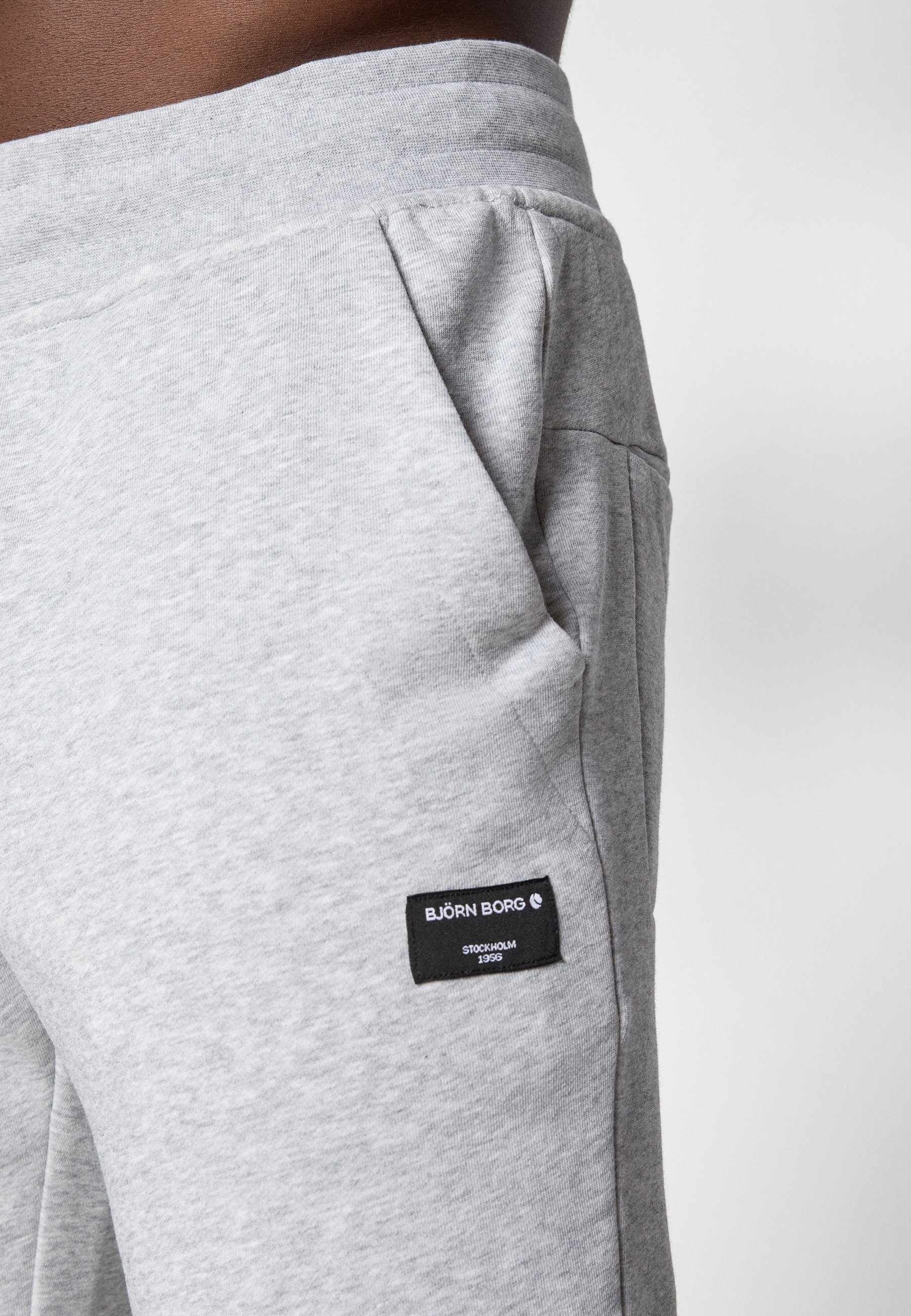 Pantaloni della tuta affusolati Björn Borg - Pantaloni da tuta - grigio chiaro mélange