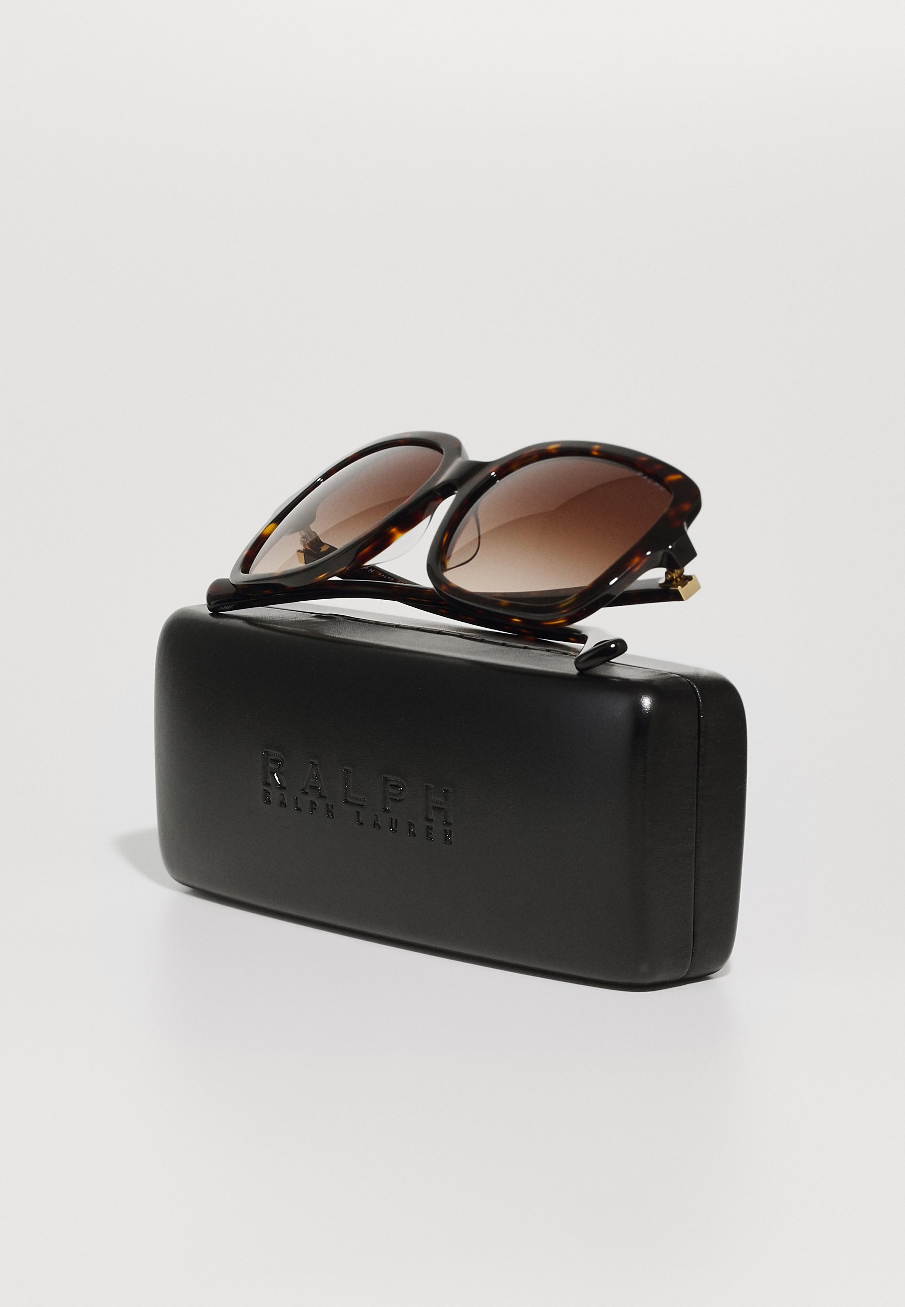 RALPH Ralph Lauren saulesbrilles - spīdīgas, tumšas havanas krāsas