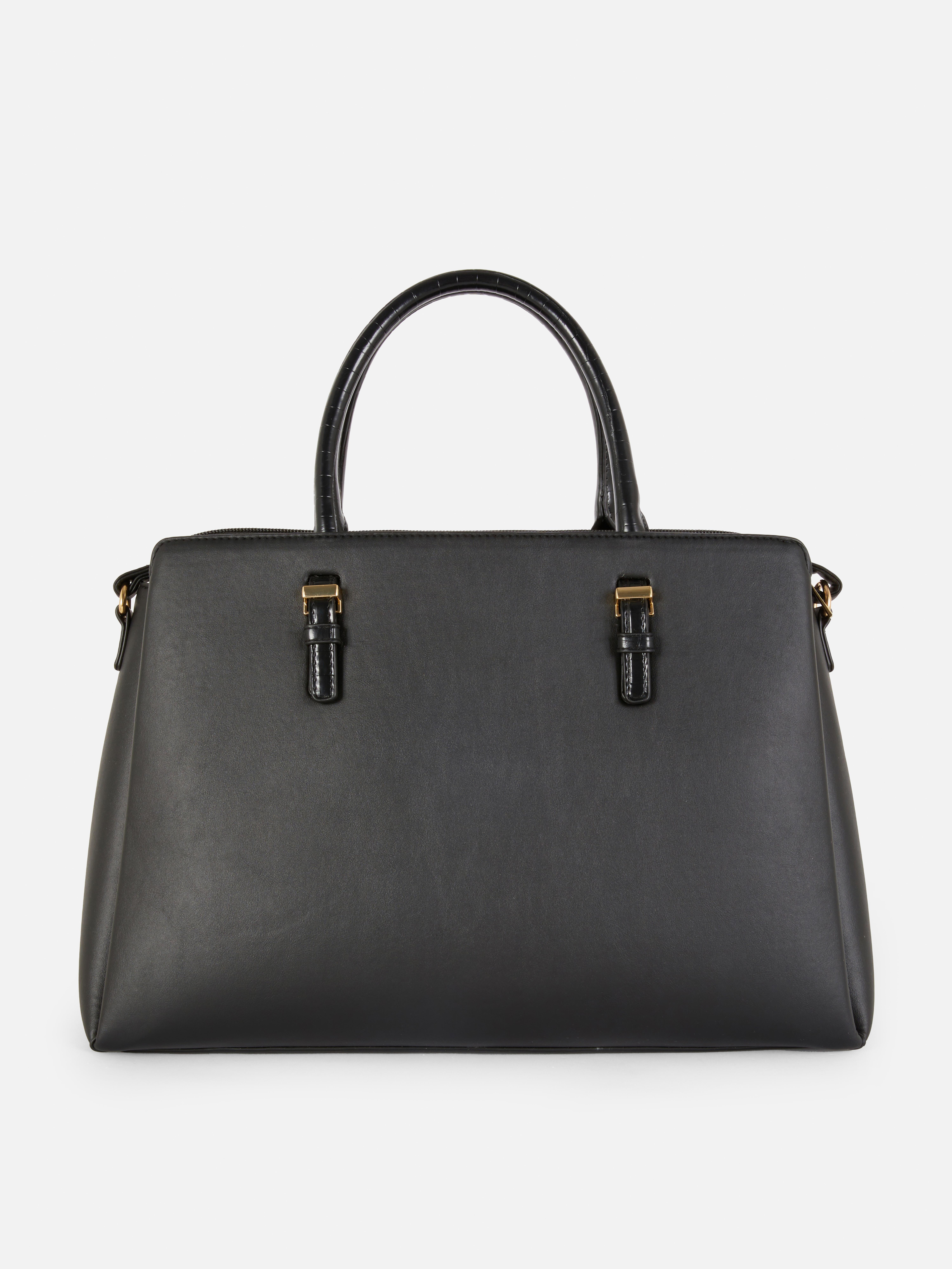 Tragetasche aus Kunstleder mit herausnehmbarem Innenfach. Eine klassische Shoppertasche mit praktischem, herausnehmbarem Innenfach.