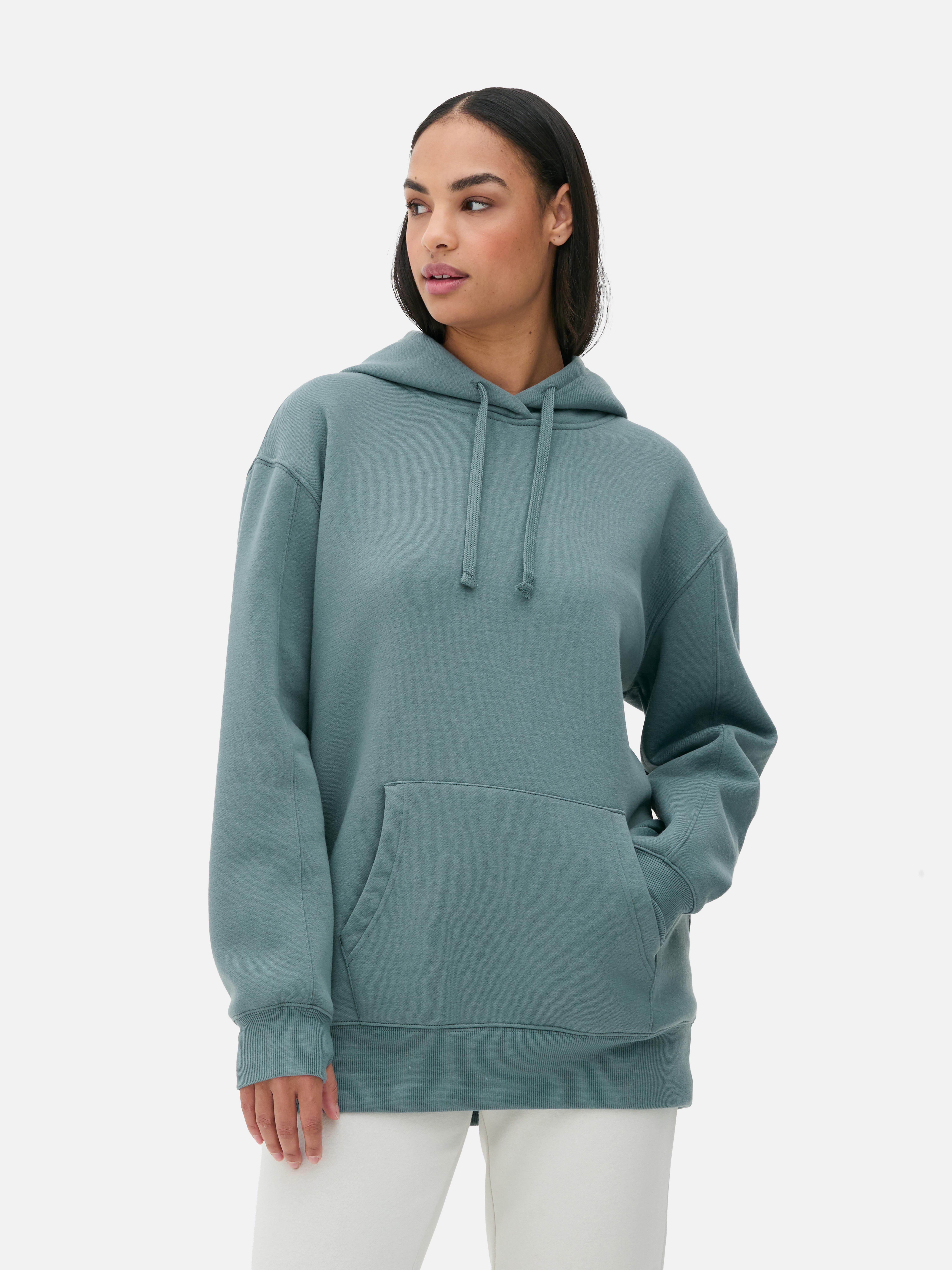 Κλασικό oversized φούτερ με κουκούλα Ένα casual oversized φούτερ με κορδόνι περίσφιξης και τσέπη καγκουρό