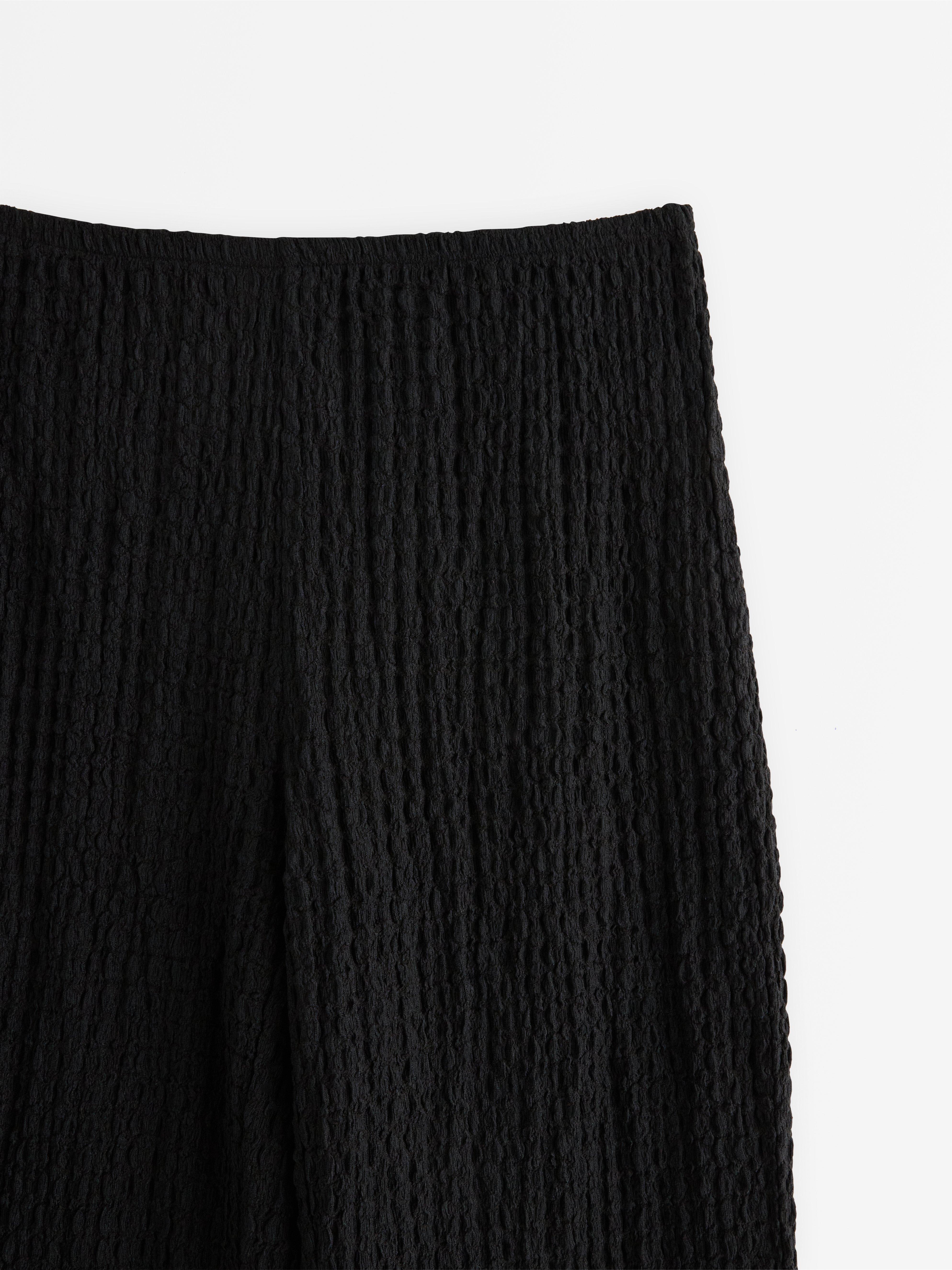 Pantalones de punto texturizado negros