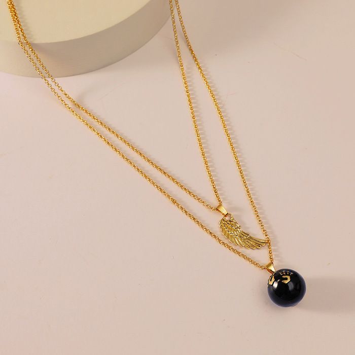 Pregnancy Bola Necklace with Tiny Footprints, Musical Chime Bell Necklace, Gold Angel Wing Pendant, and Pregnancy Jewelry