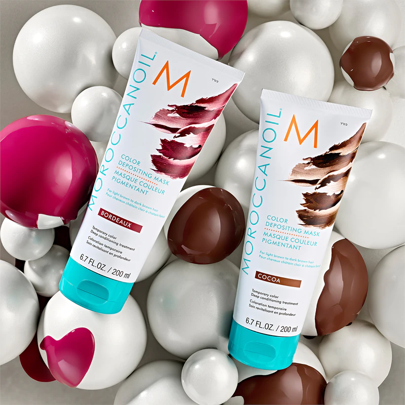 Jemná vyživujúca maska Moroccanoil Color Depositing bez permanentných farebných pigmentov