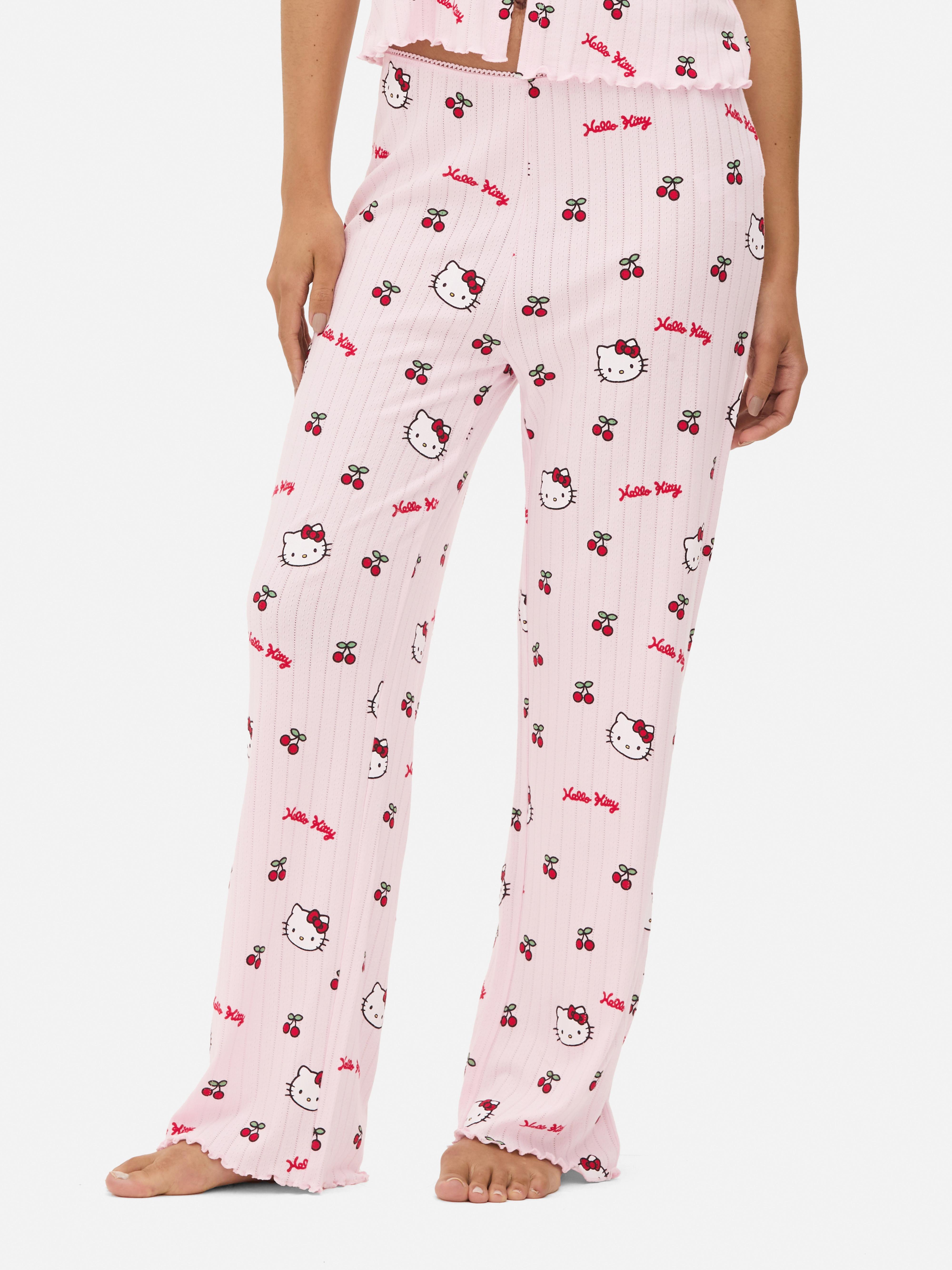 Pantaloni de pijama Hello Kitty cu broderie ajurata Un pantalon de pijama Hello Kitty cu broderie ajurata, garnitură cu picot și tiv festonat