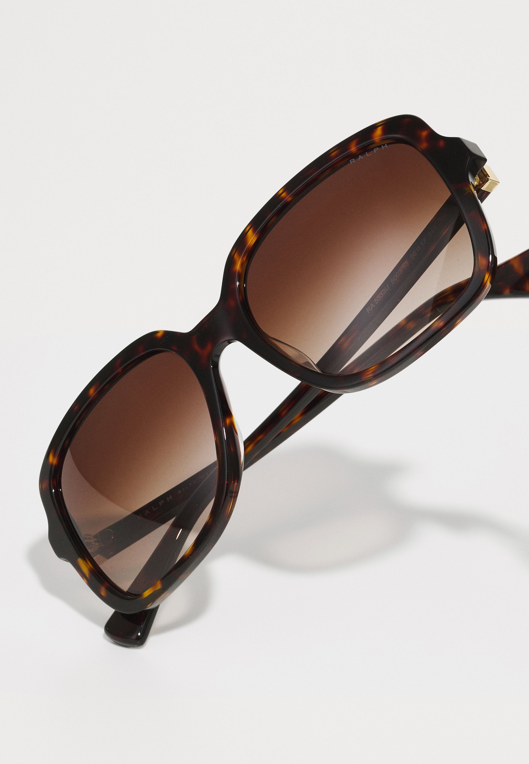 RALPH Ralph Lauren saulesbrilles - spīdīgas, tumšas havanas krāsas