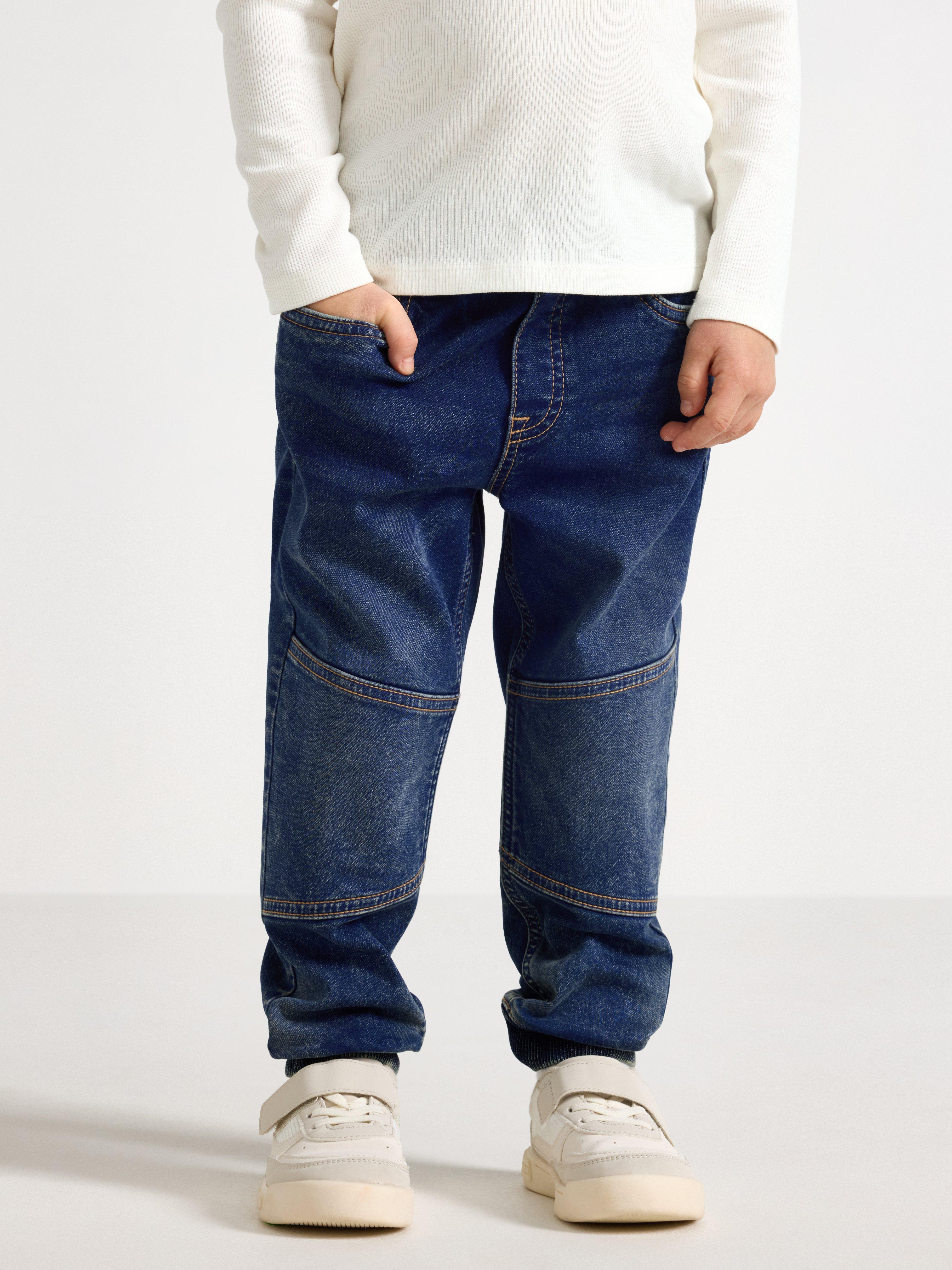 Pantalones vaqueros anchos WILMER de punto vaquero con rodillas reforzadas