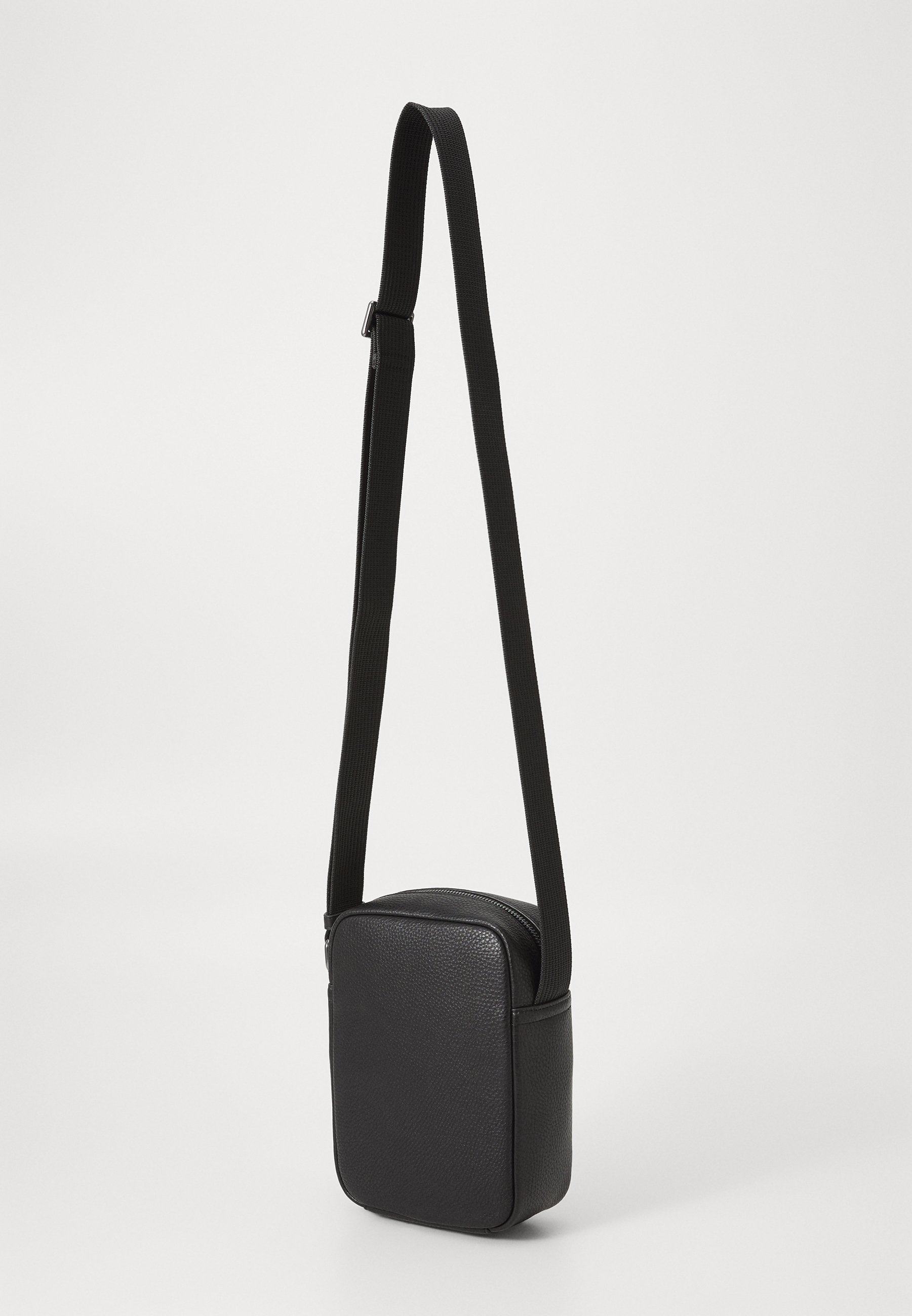 Tommy Hilfiger CENTRAL MINI REPORTER - Torebka typu crossbody - czarna