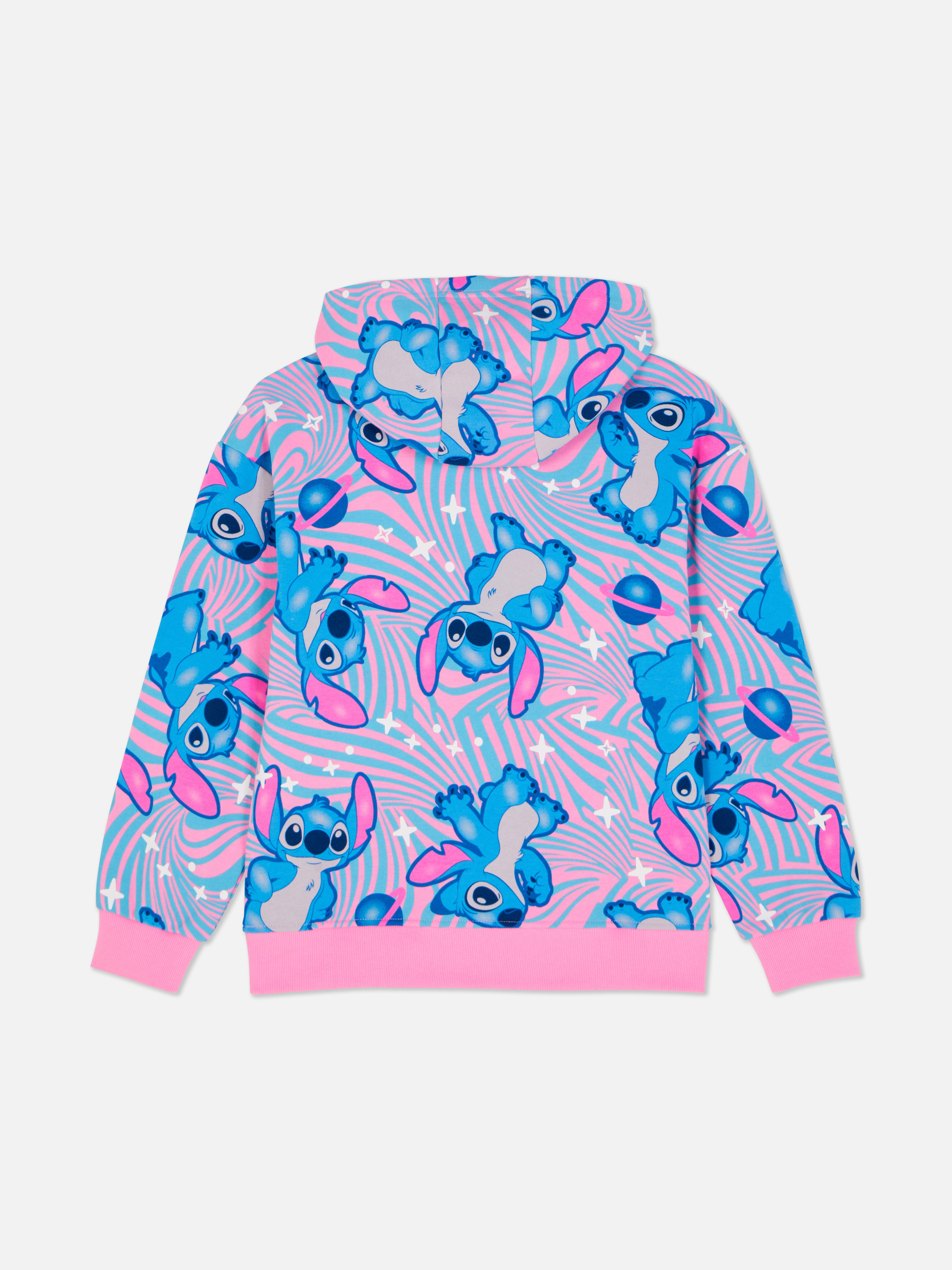 Hanorac cu imprimeu Disney Stitch. Acest hanorac cu imprimeu Disney Stitch are umeri căzuți și manșete cu nervuri.